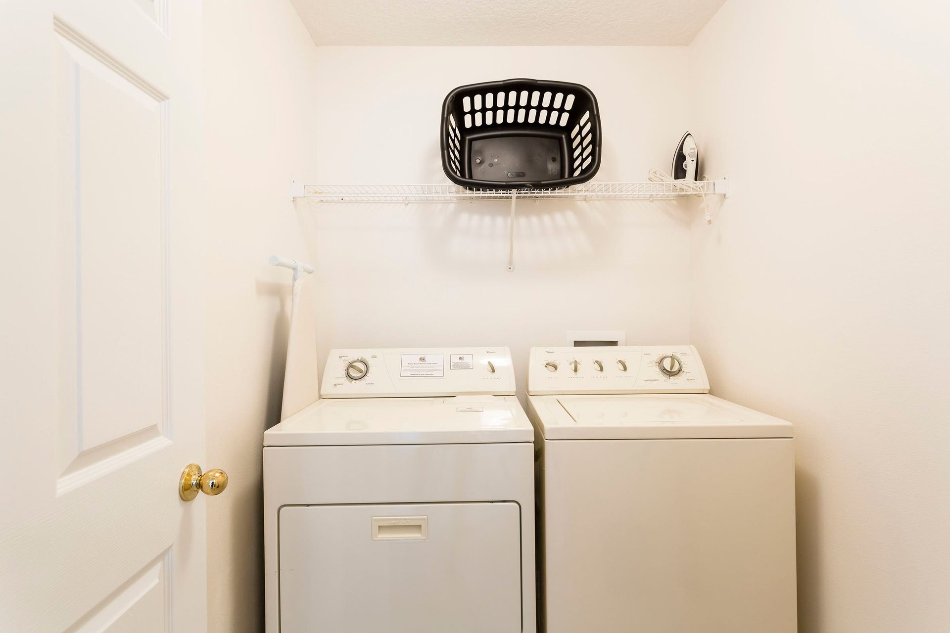 Laundry Room: Equipped with a washer for convenient and efficient laundry care within a dedicated and organized space