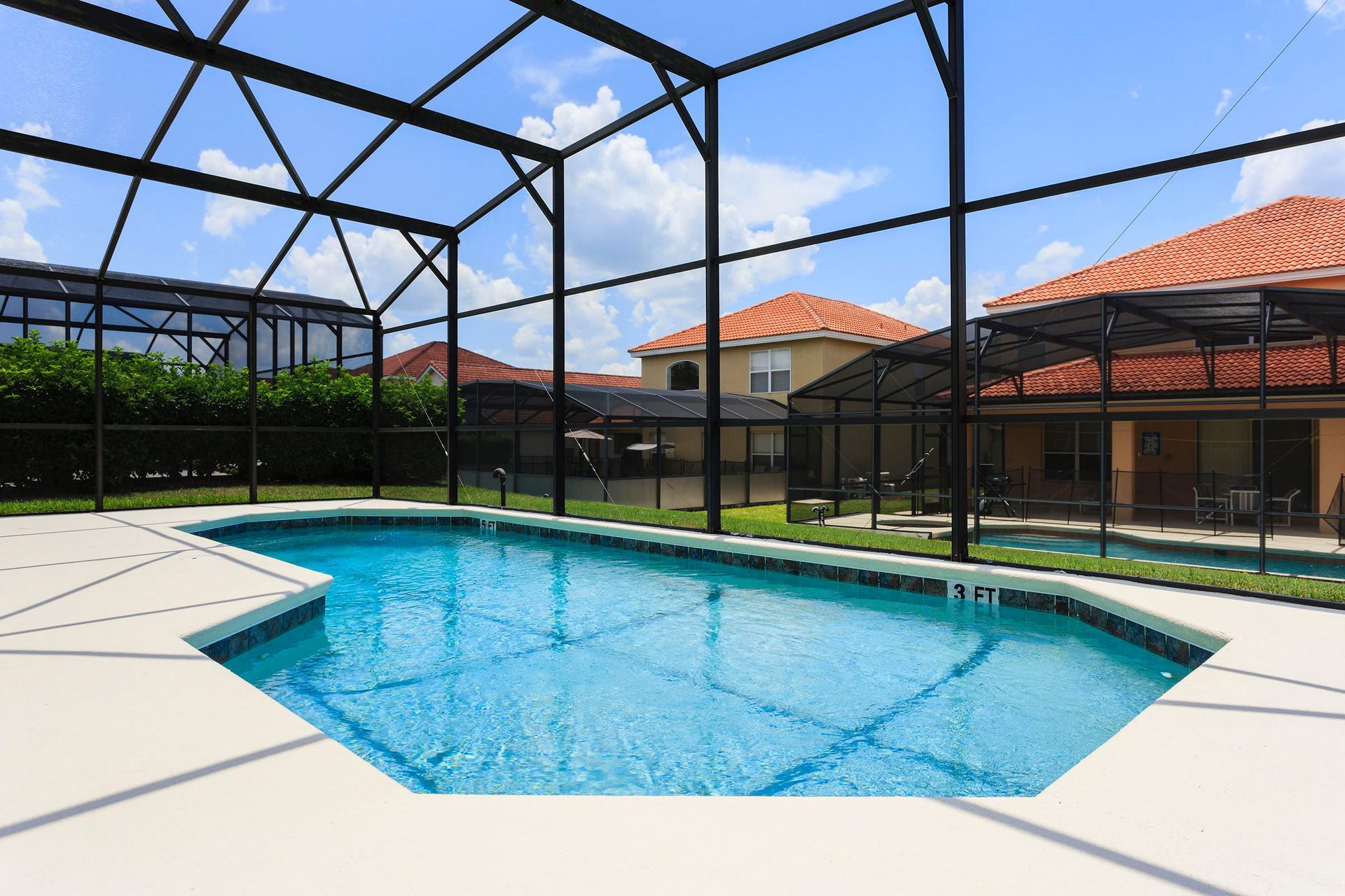 Home Pool: Enjoy a screened oasis, providing a private and serene swimming experience