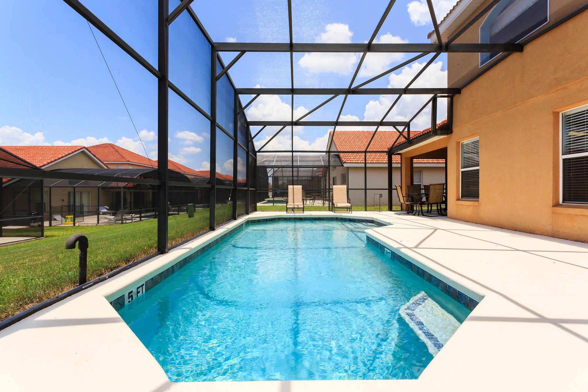 Home Pool: Enjoy a screened oasis, providing a private and serene swimming experience