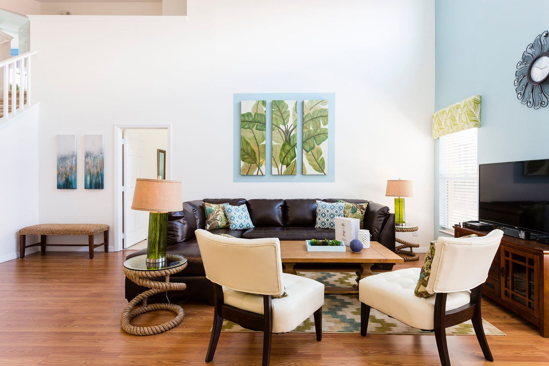 Living Room: Spacious and inviting, the area features a cozy sofa, perfect for a family reunion, providing comfort and a warm atmosphere.