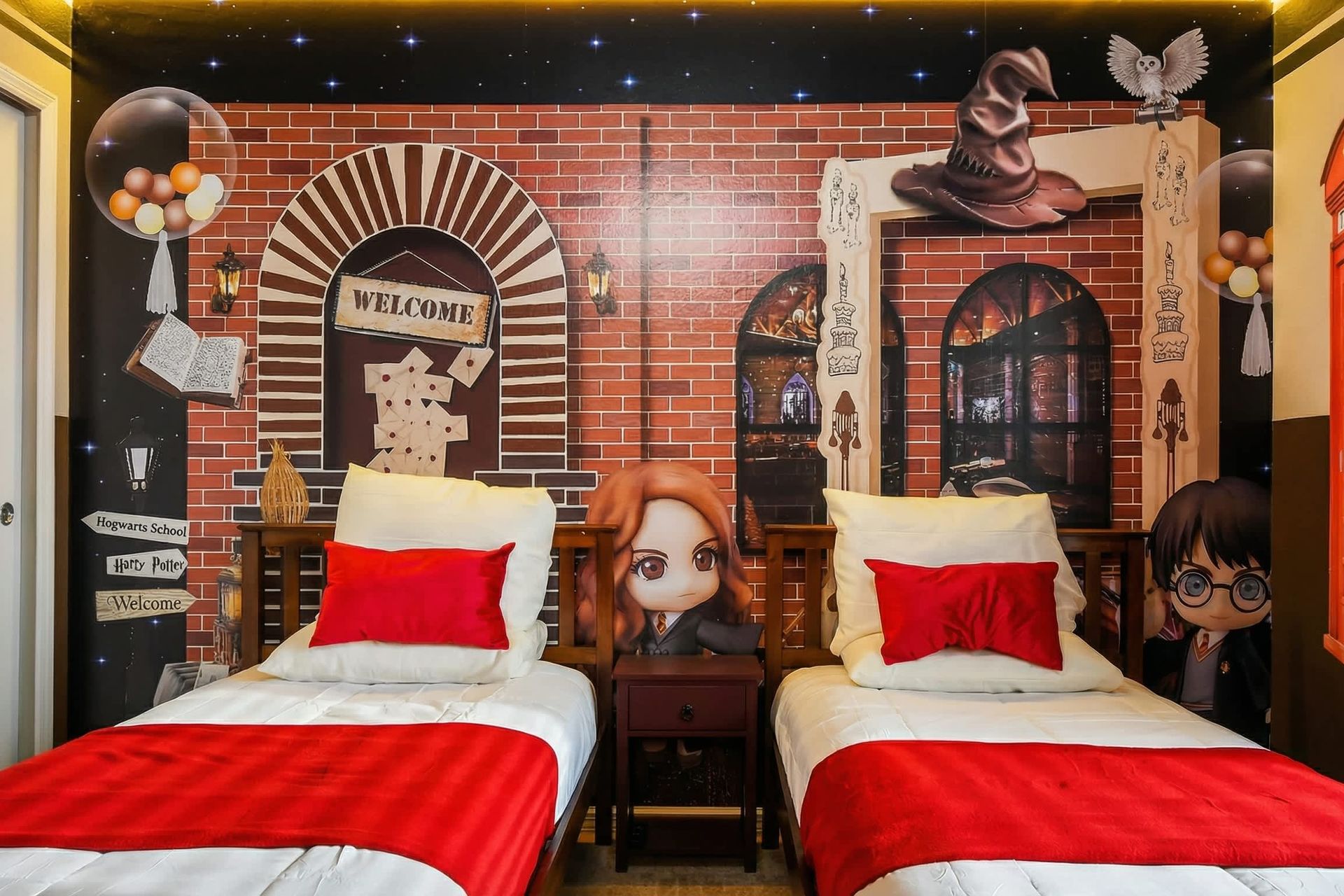 Spellbinding twin room with enchanting Hogwarts mural and magical charm.