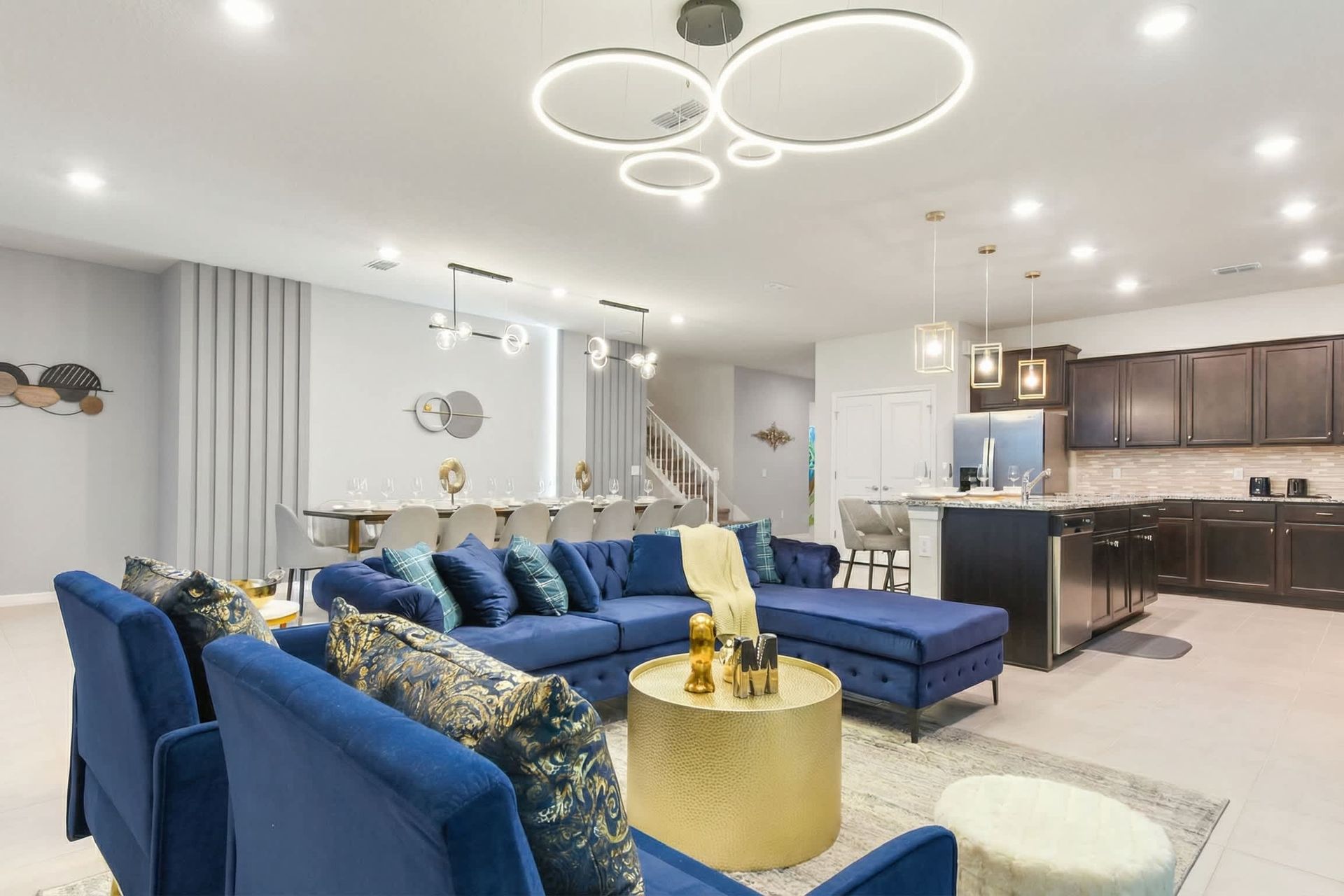 Expansive modern home, elegant dining, sleek kitchen, perfect for entertaining.