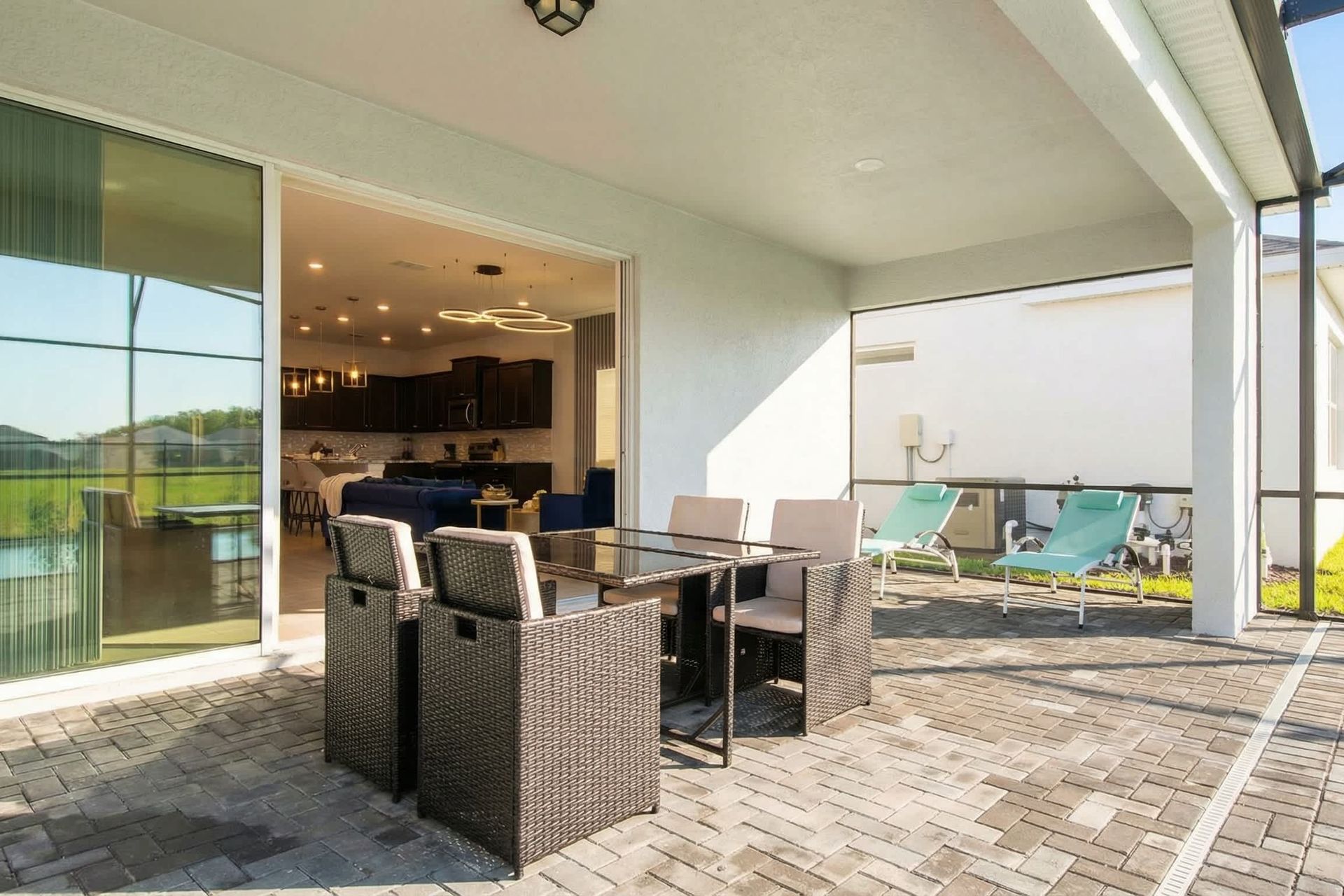 Indoor-outdoor living at its finest—dine al fresco just steps from the pool.