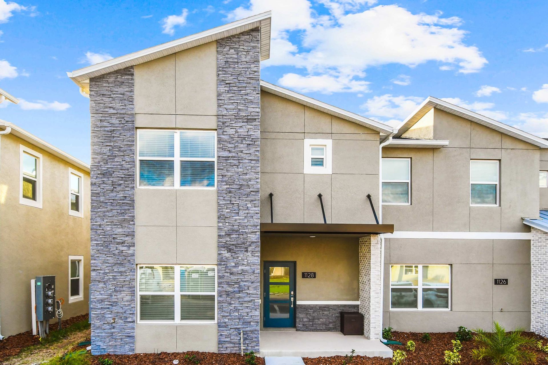 Stunning modern home with sleek design, offering a blend of beauty and contemporary elegance