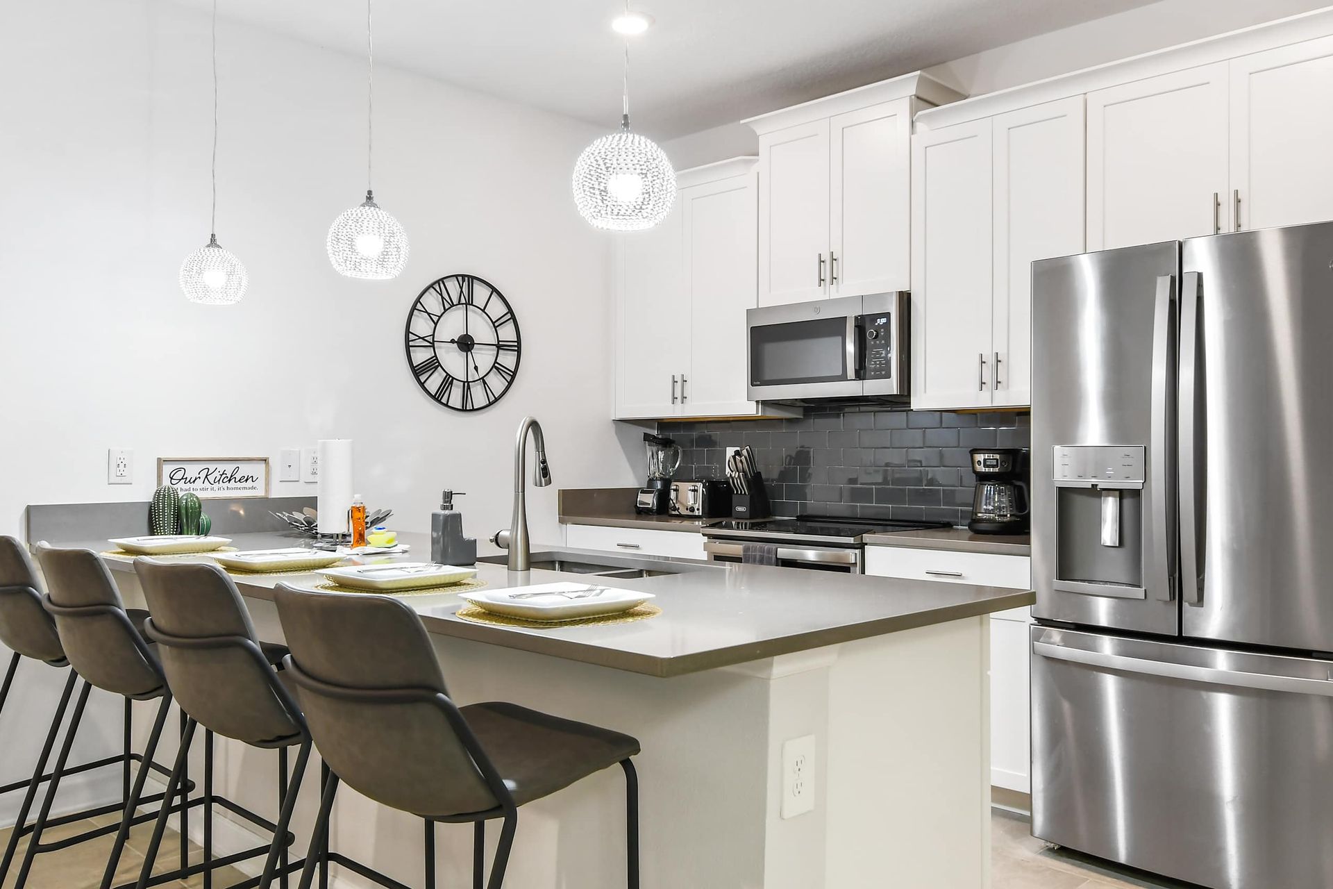 Compact kitchen with a quaint mini breakfast bar for cozy and convenient dining