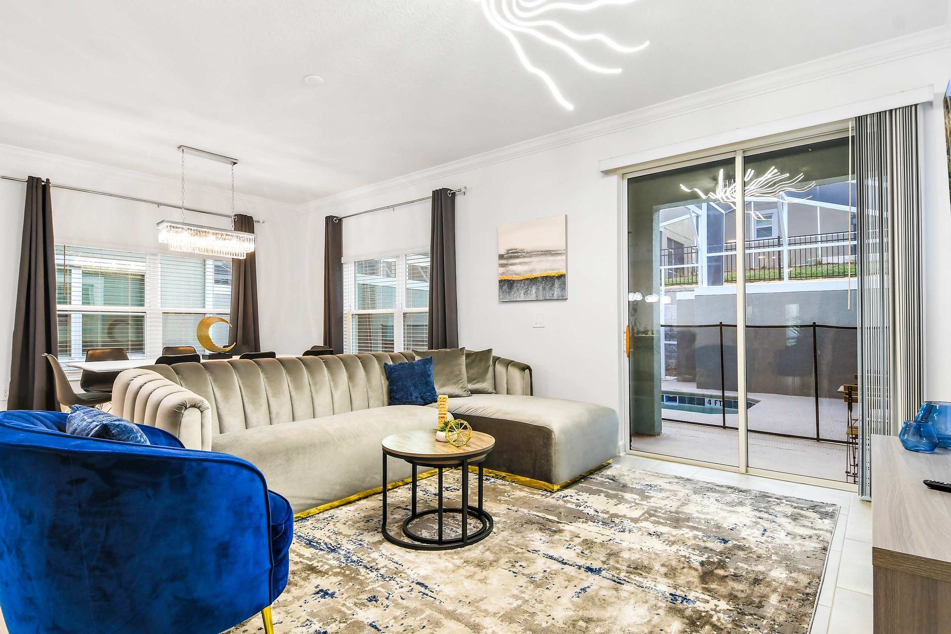 Generous family reunion space, featuring a comfy sofa in a spacious living area for shared moments