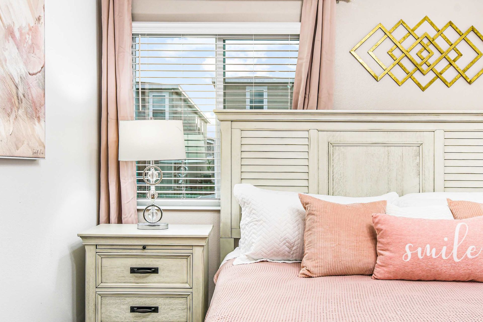 Opulent master bedroom boasts a spacious king bed, complemented by a crib for added comfort