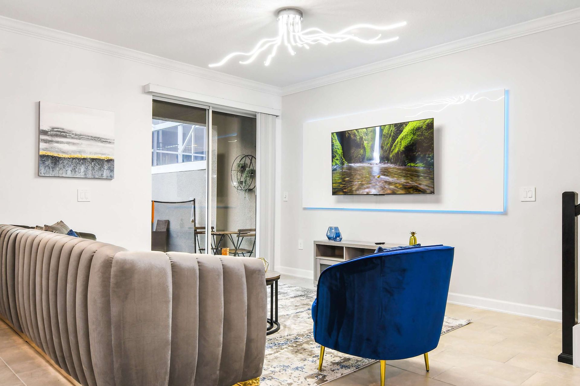 Generous family reunion space, featuring a comfy sofa in a spacious living area for shared moments