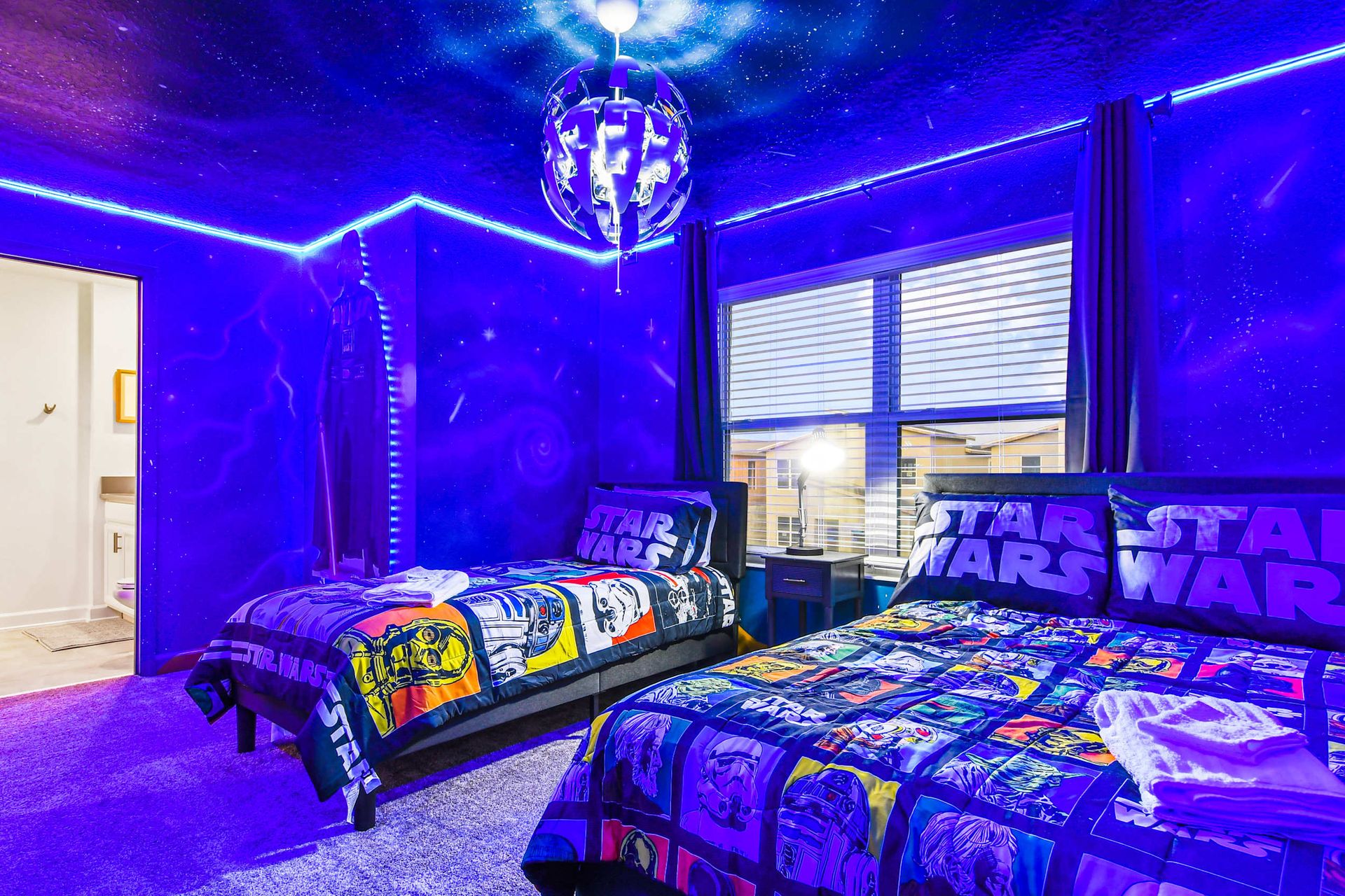 Immersive Star Wars-themed room, featuring cool lights for an intergalactic and adventurous atmosphere.