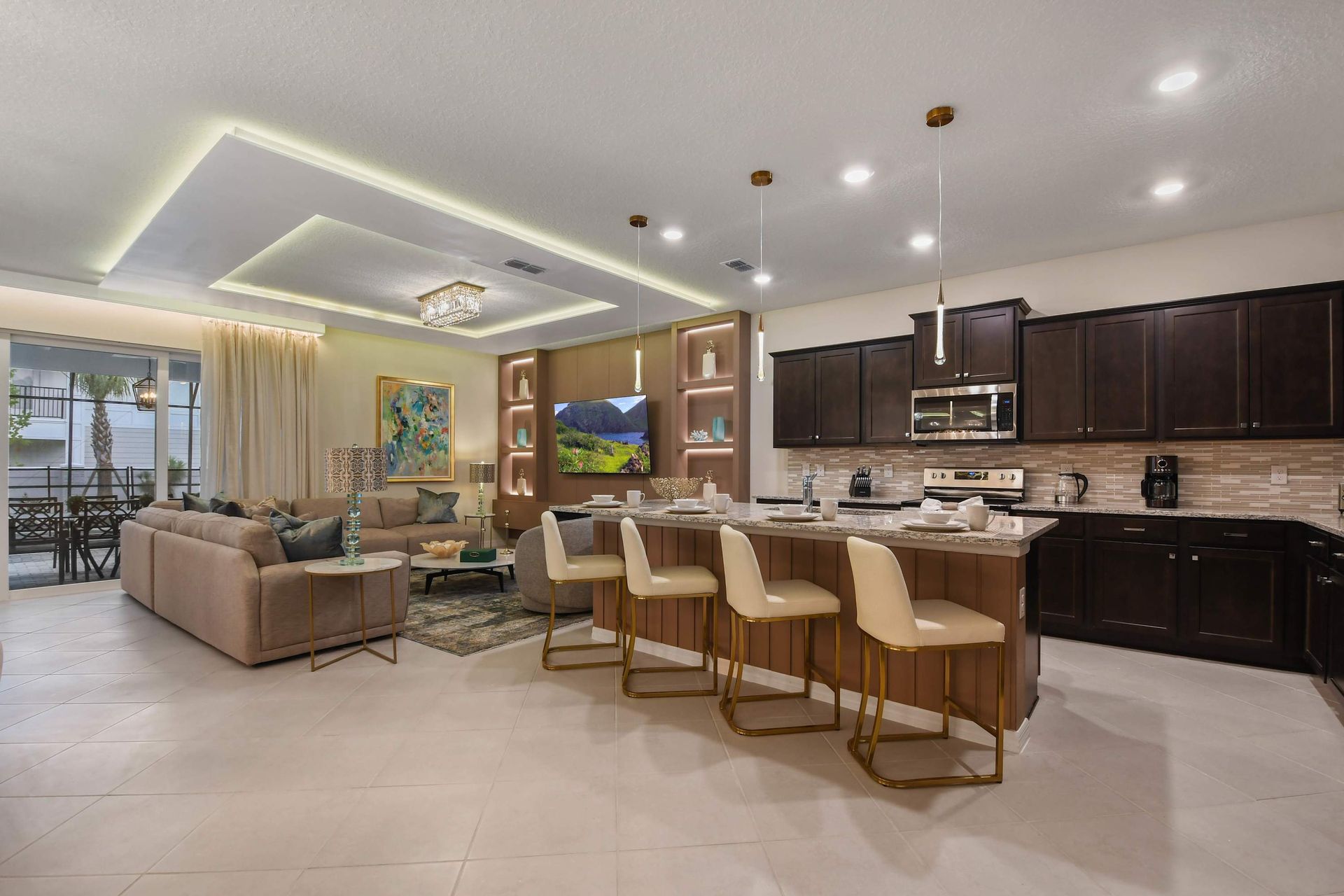 Chic open-plan kitchen and living area with modern, cozy vibes.