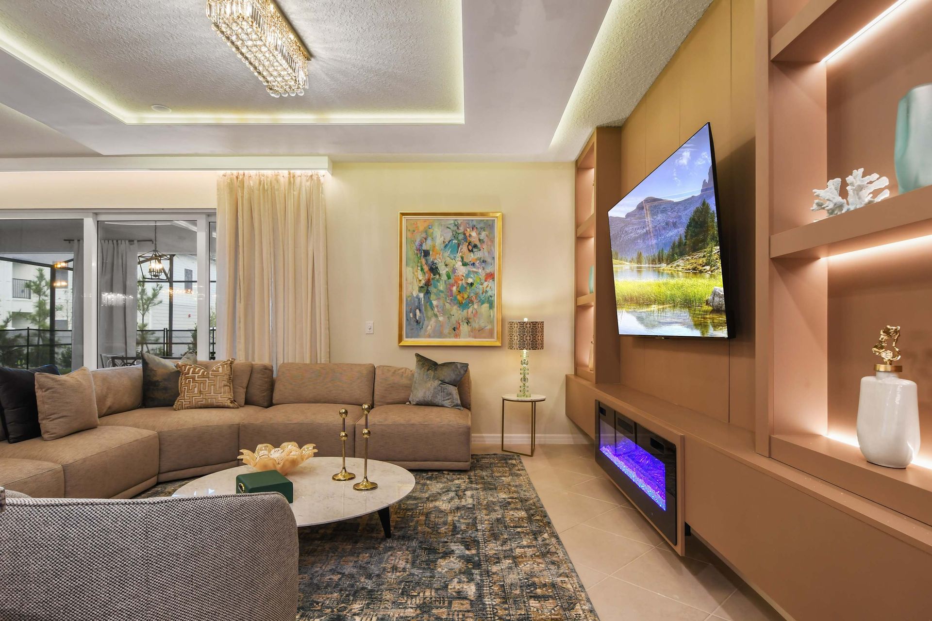 Modern luxury living room with cozy seating, TV, and sleek design.