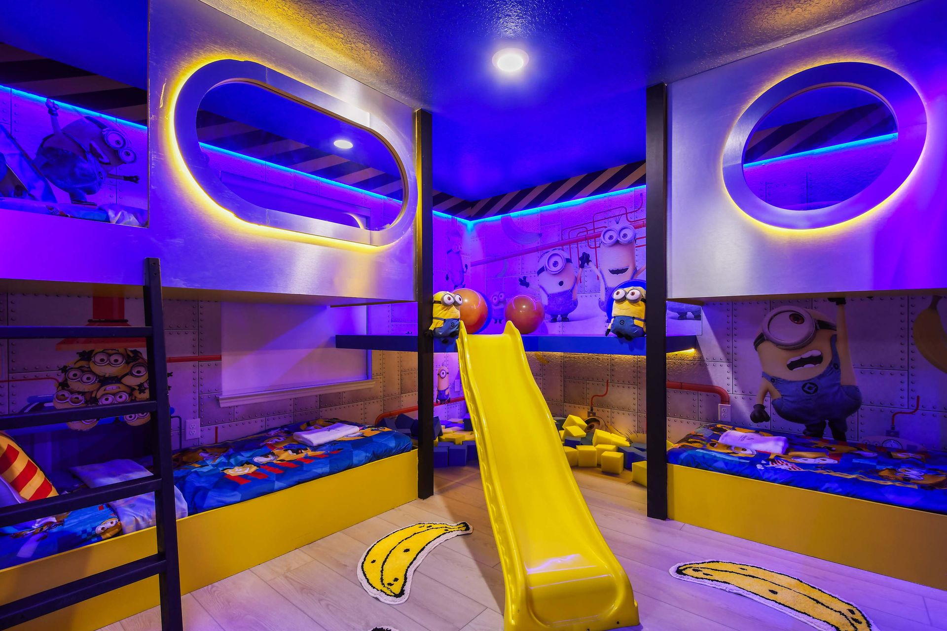 Delight the kids with this playful Minions - themed bedroom featuring vibrant decor, cozy bunk beds, and have fun slide for endless entertainment.