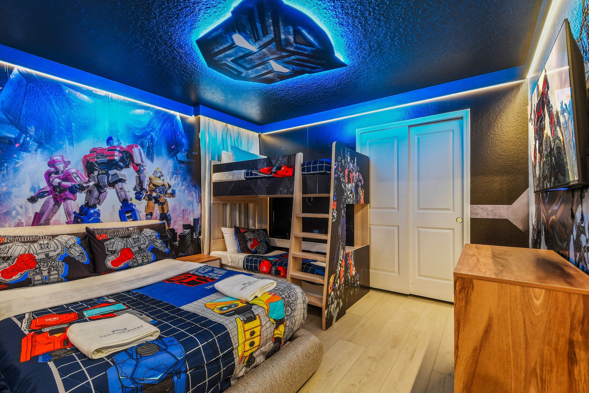 Transformers-themed room with glowing decor and bunk bed adventure!