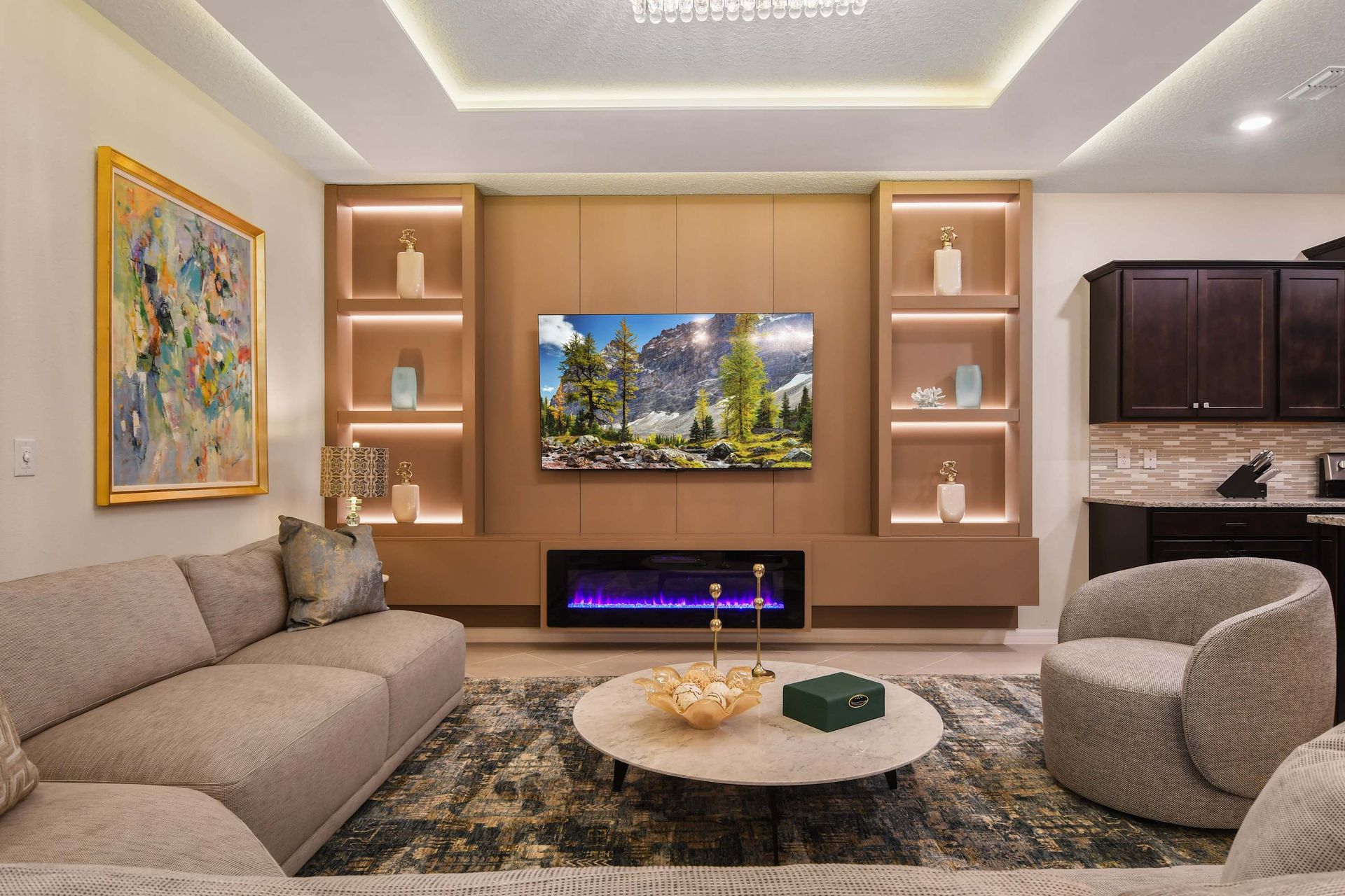 Modern living room with fireplace, smart TV, and elegant decor.