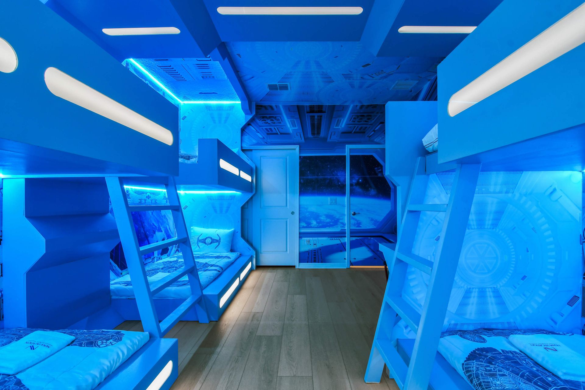 Space adventure room with glowing bunk beds and galactic design!
