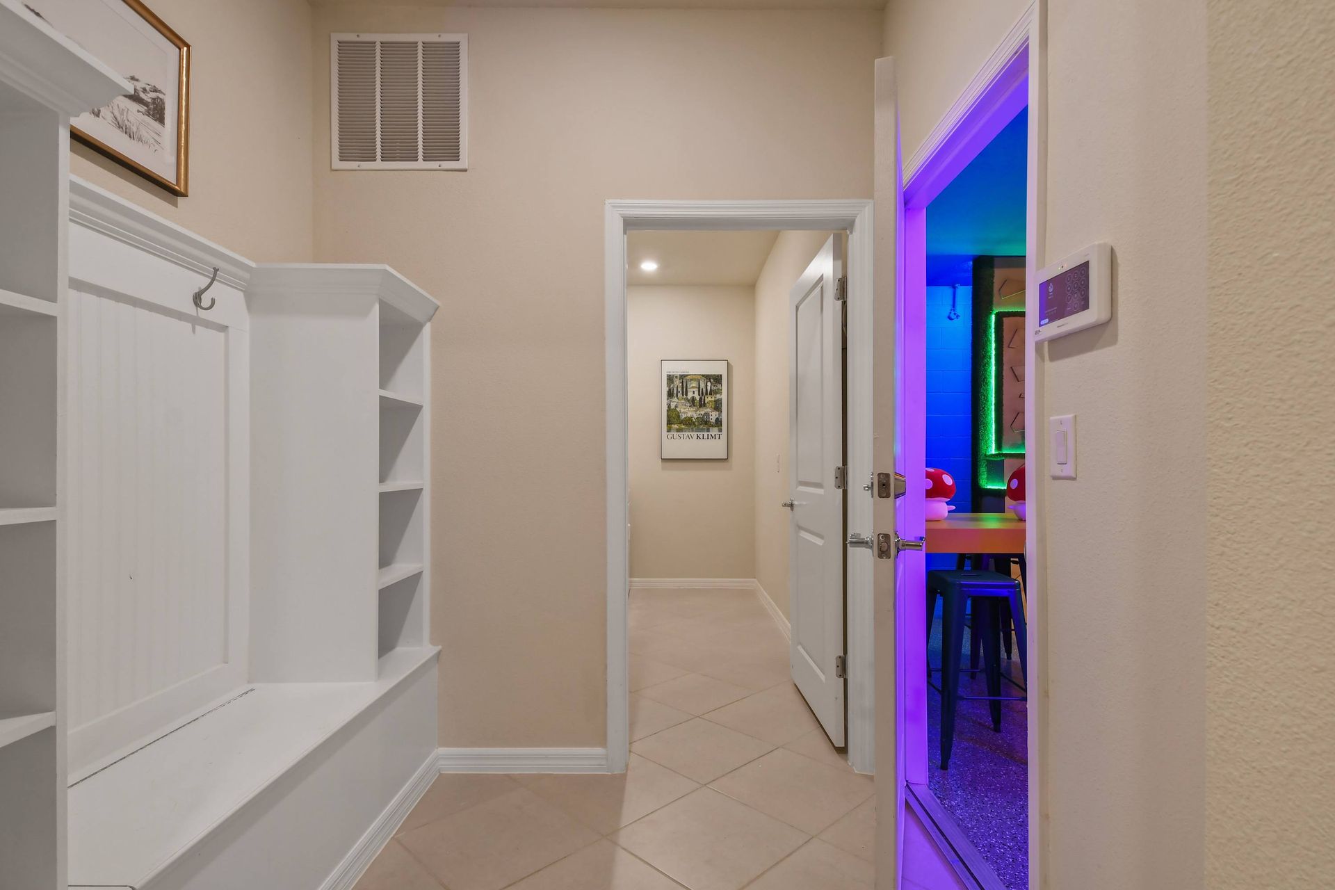 A functional and tidy mudroom with built-in storage and seating!