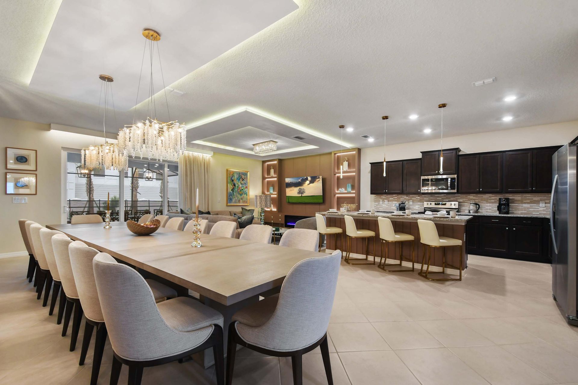 Expansive dining and kitchen area with seating, elegance, and charm.