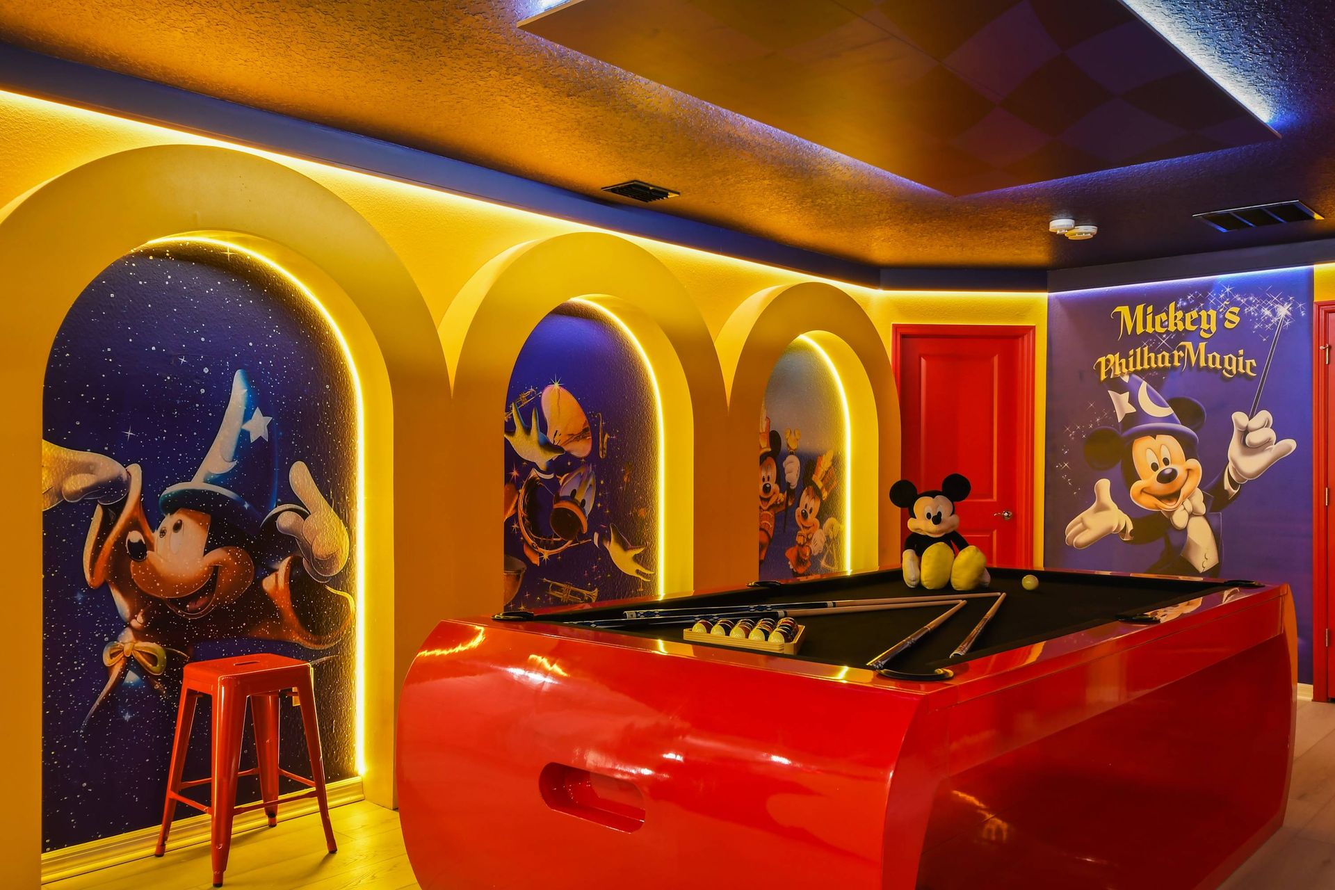 Magical Mickey-inspired billiards room with vibrant Disney vibes!