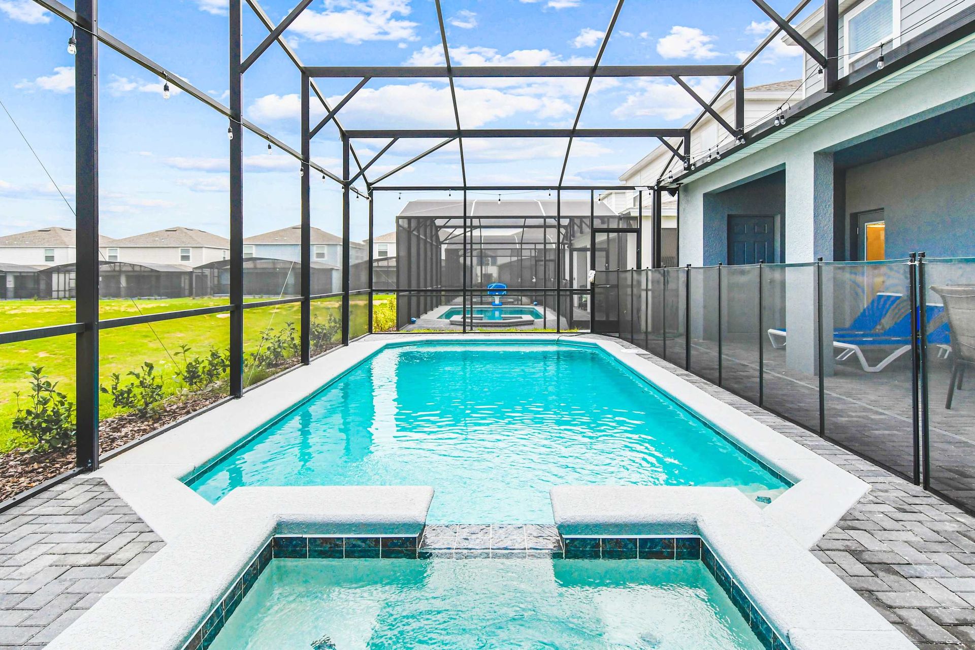 Swim, soak, and unwind in your private screened-in pool and spa oasis.