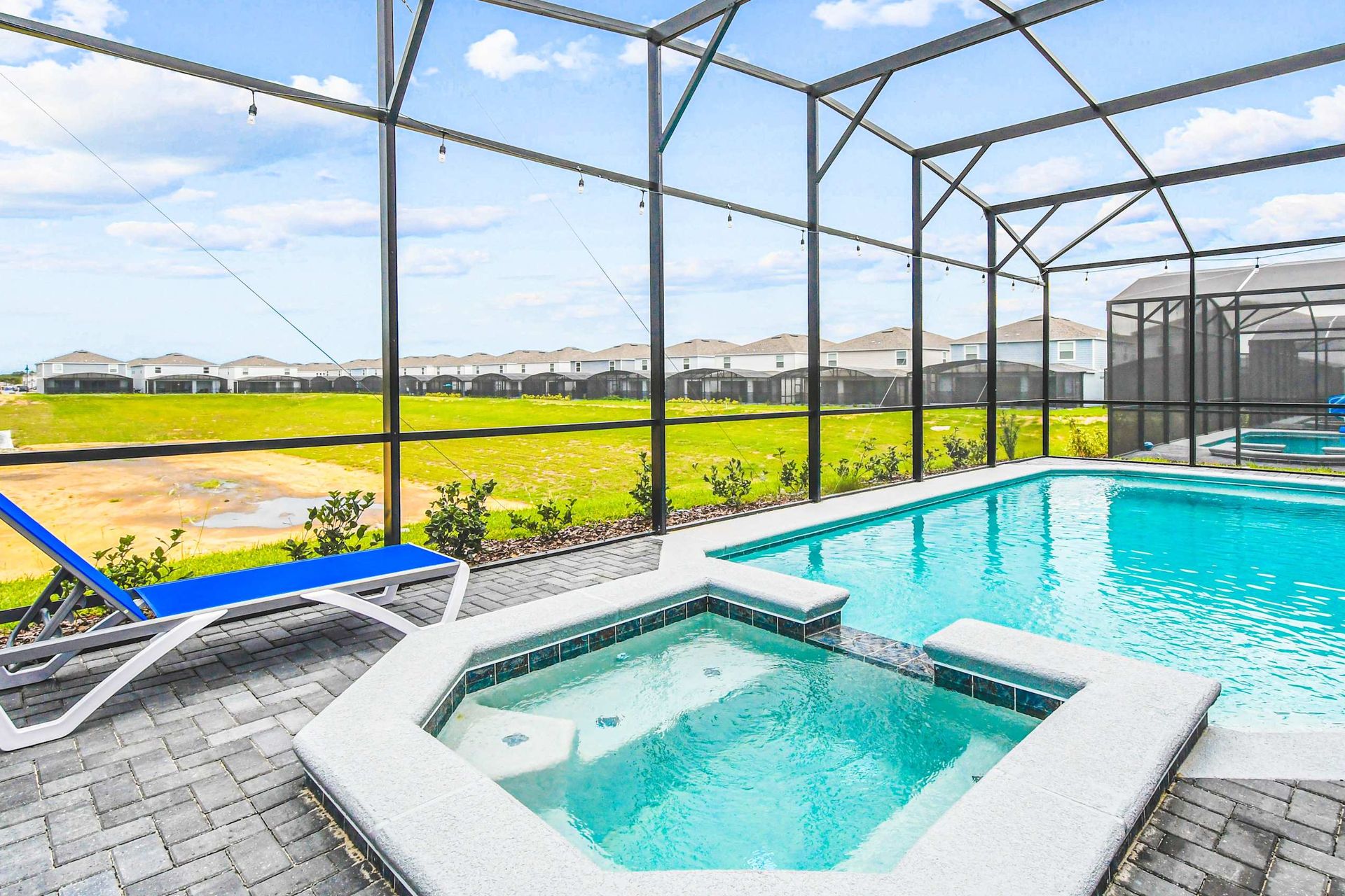 Relax in the private spa or soak up the sun by your screened-in pool retreat.