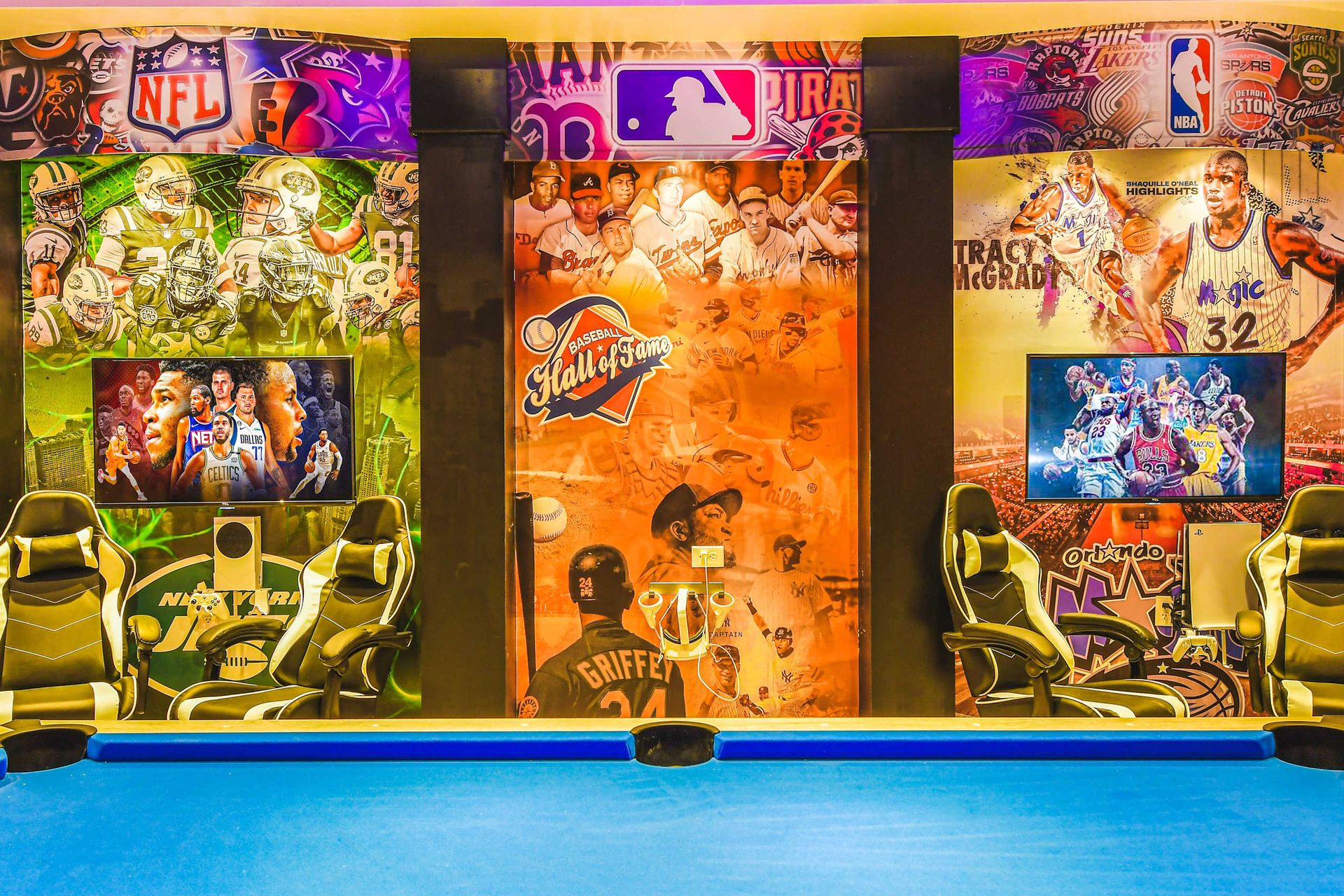 Sports fan’s dream game room with bold murals, gaming chairs, and pool table fun.