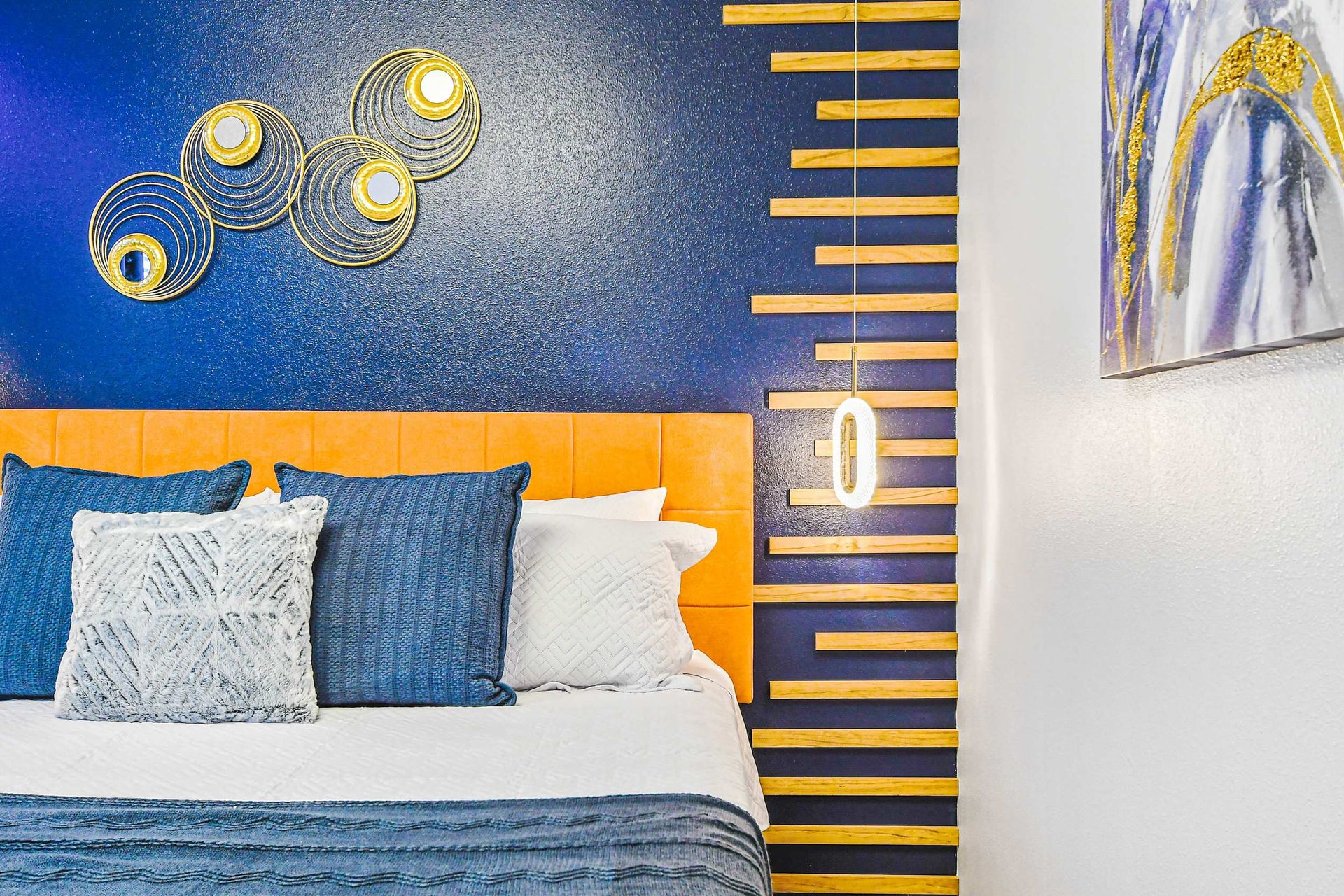 Modern luxe retreat with bold colors, artistic flair, and cozy comfort.