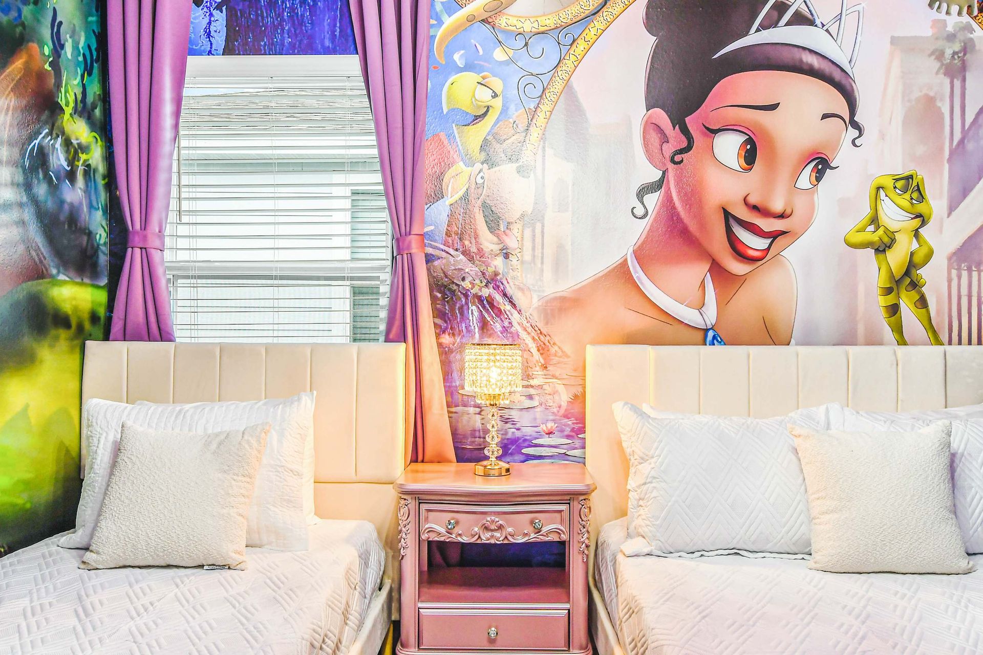 Whimsical princess-themed room with twin beds, sparkling lamp, and fairytale murals.