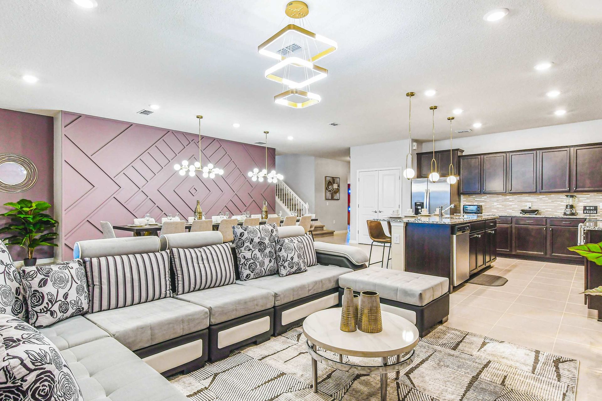 Spacious open-concept living with luxe lounge, gourmet kitchen, and designer dining.