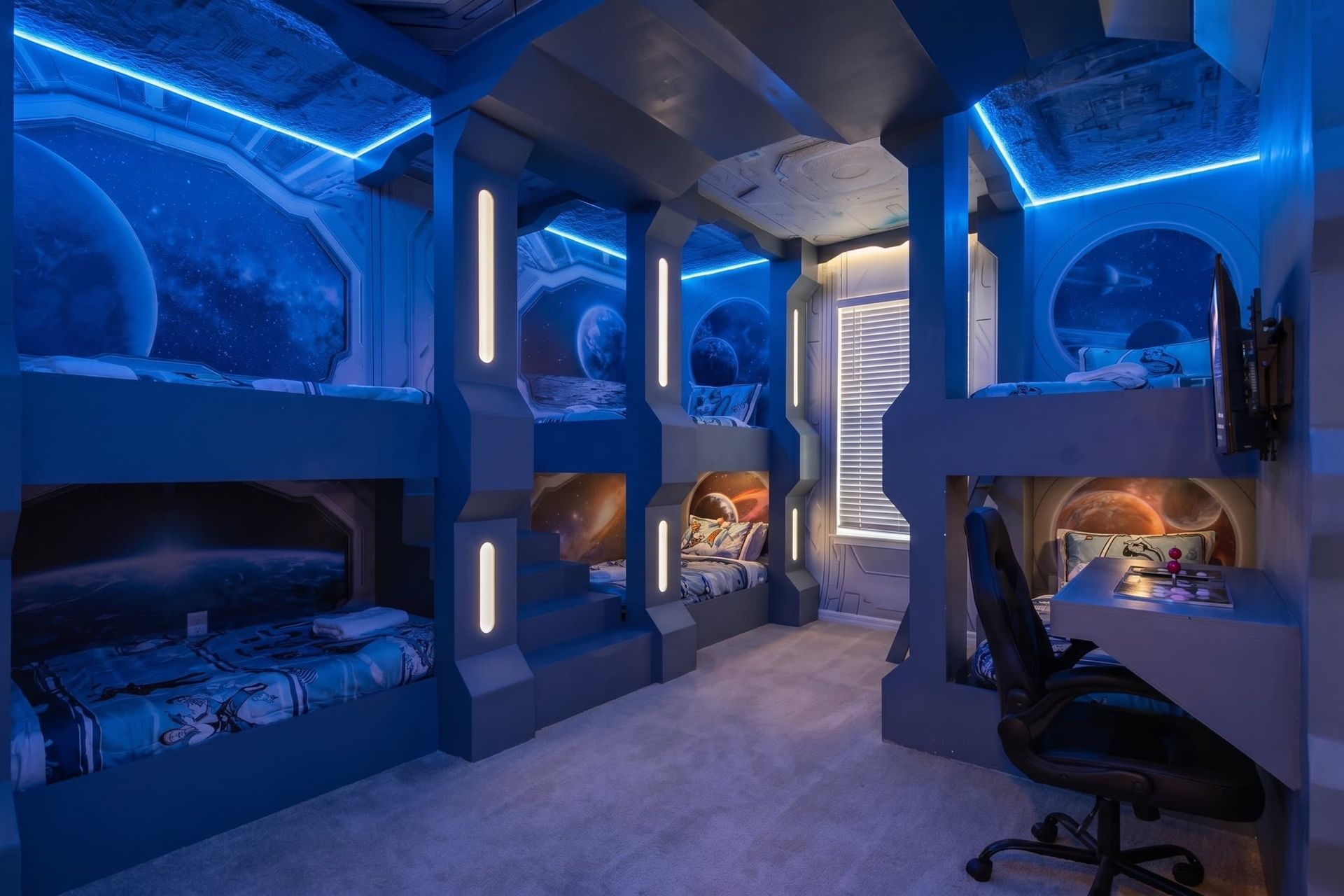 Epic space-themed bunk room with glowing lights and galactic vibes!