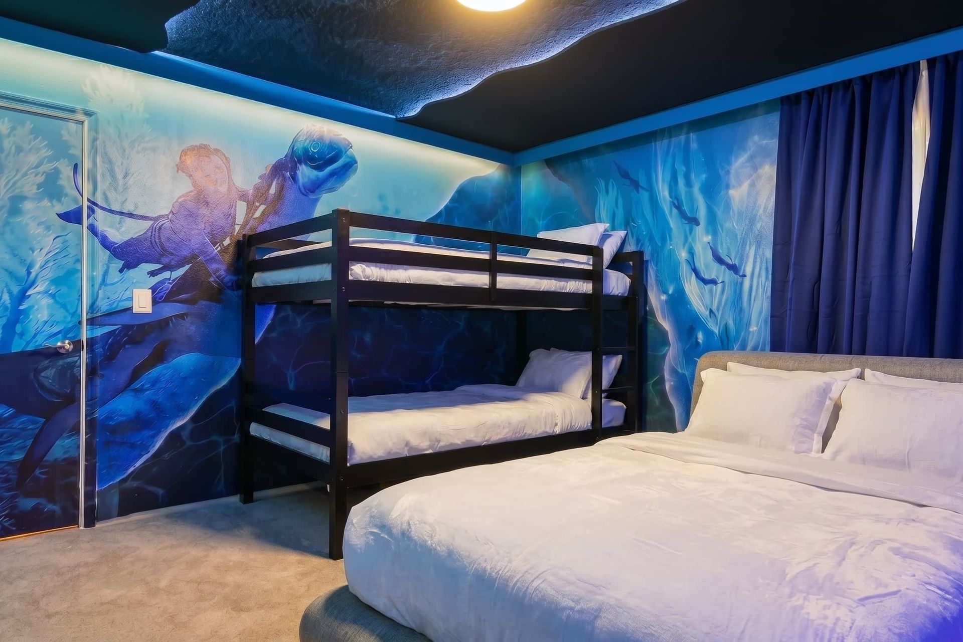 Vivid Avatar-themed bedroom with glowing ocean vibes and bunk beds!