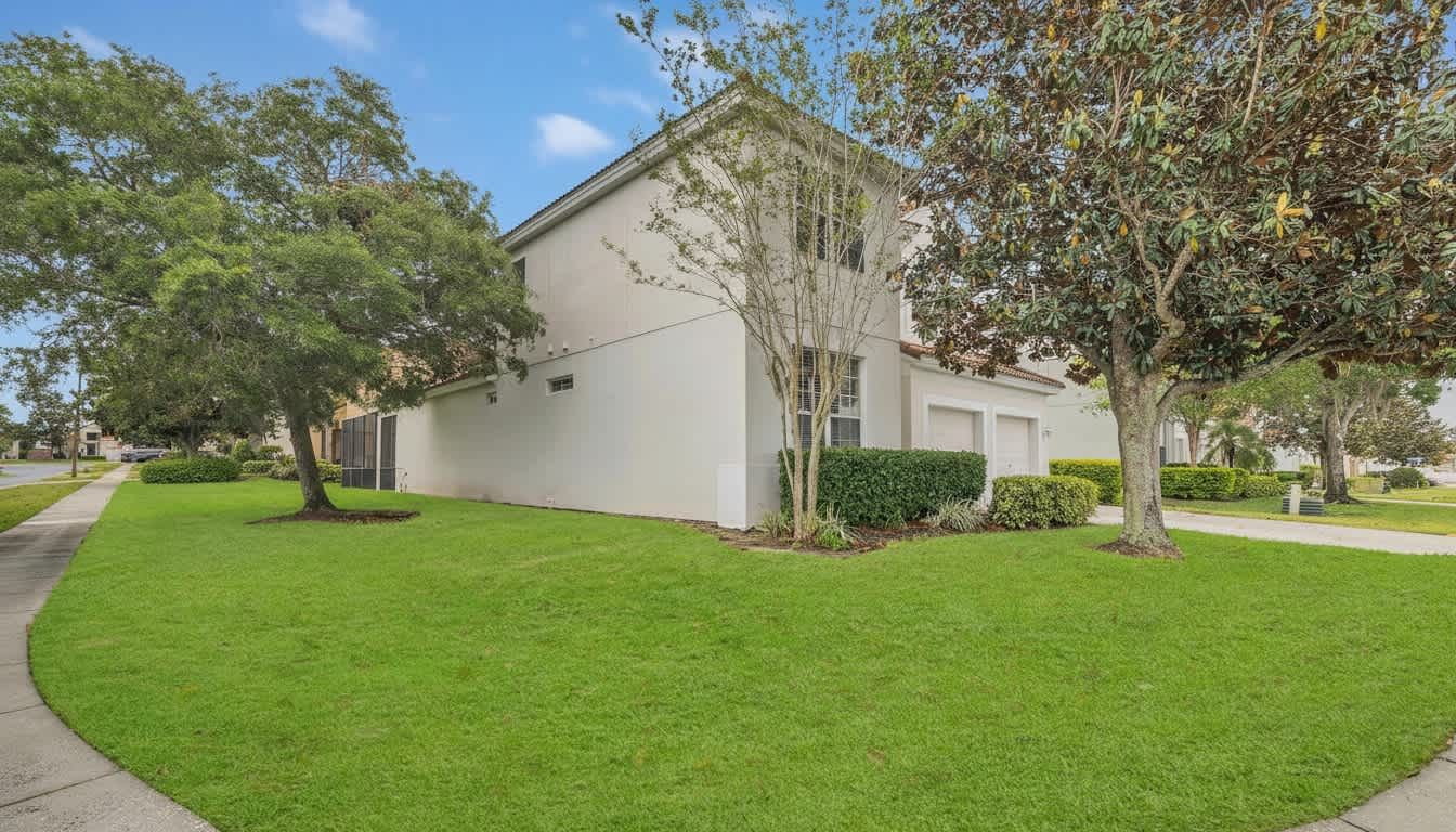 Sun-drenched modern estate nestled within a serene, verdant landscape.