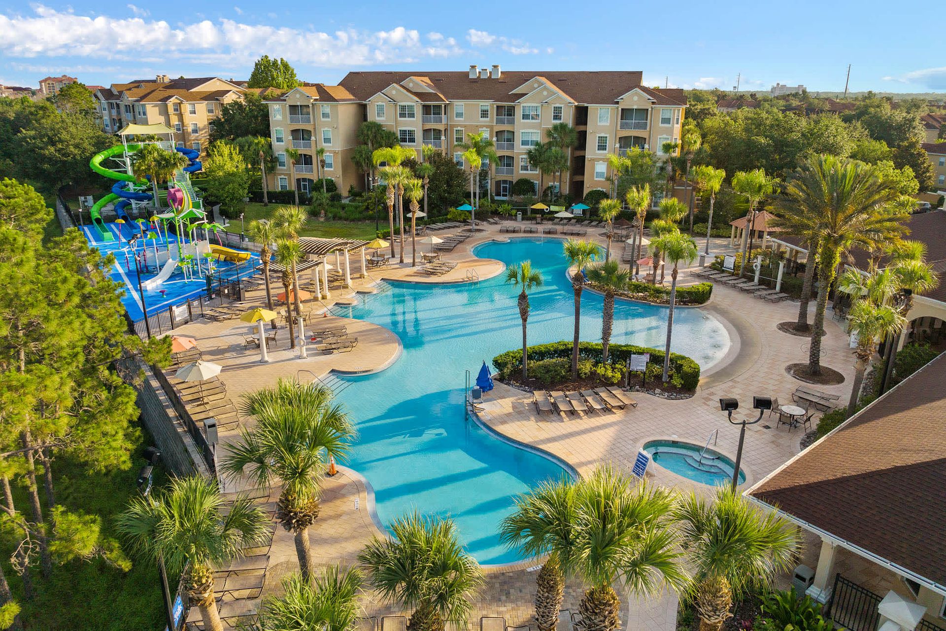 Sun-kissed resort oasis featuring sparkling pools, tropical palms, and exhilarating water park fun.