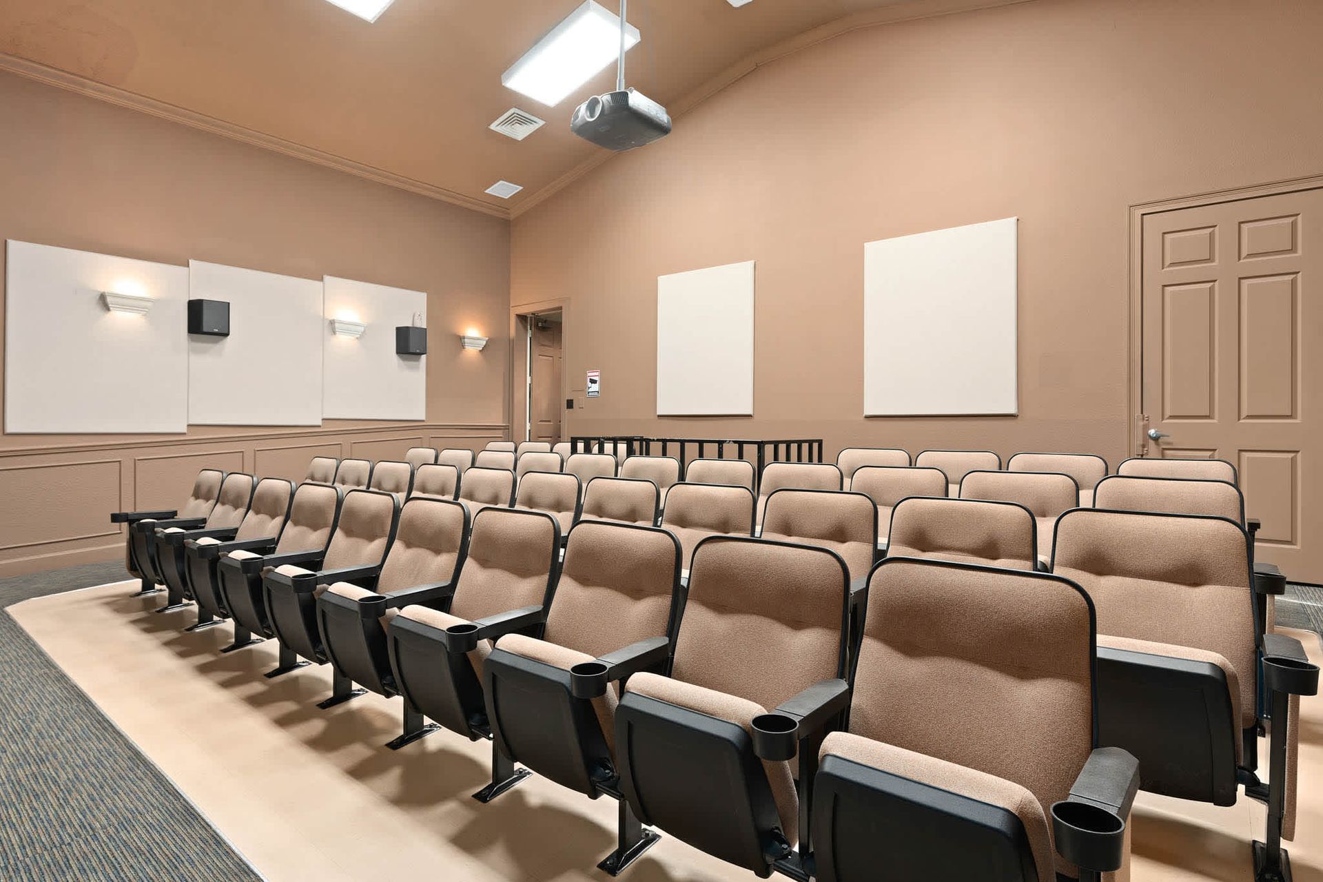 Immerse in cinematic luxury with plush tiered seating and state-of-the-art screening technology.