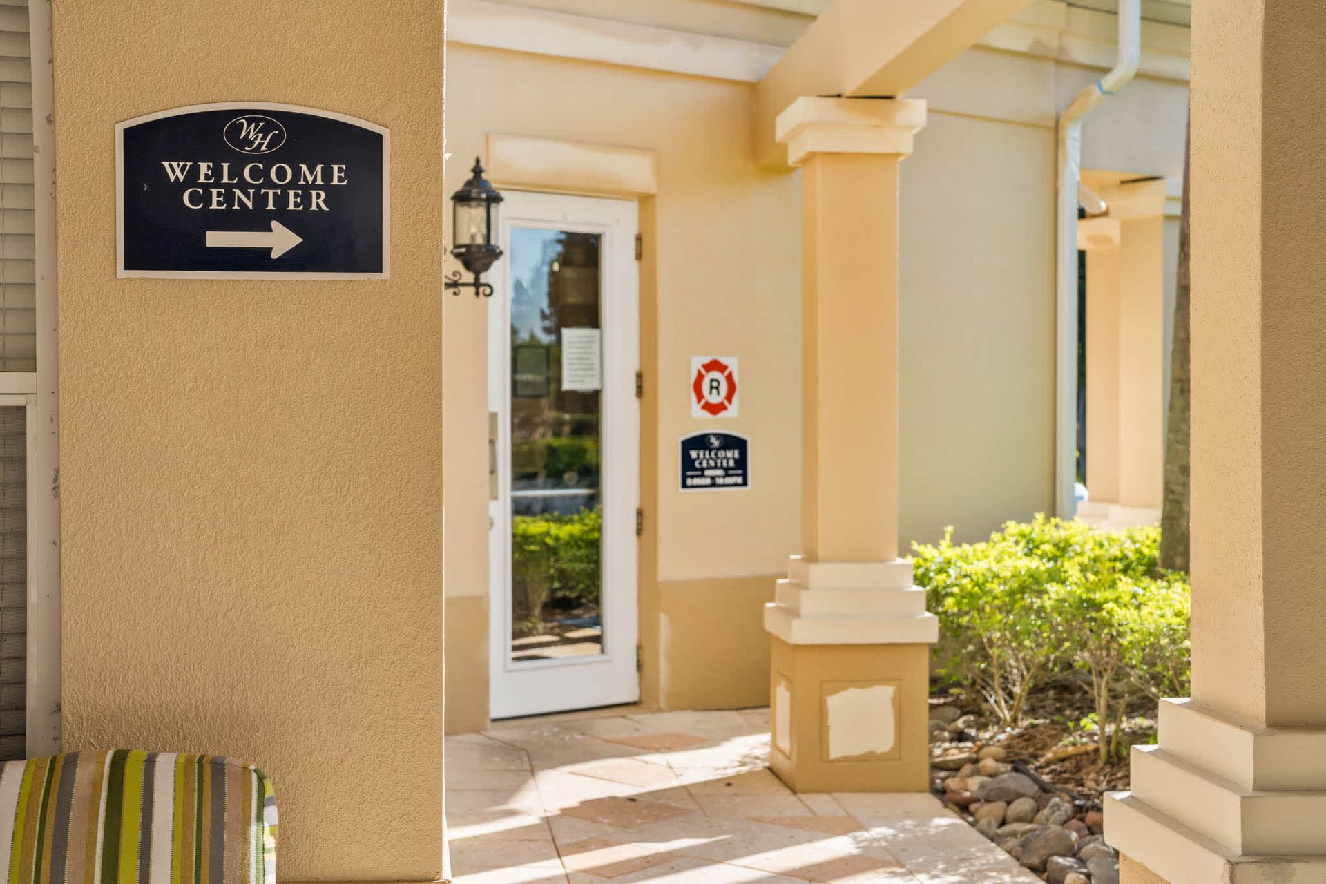 Elegant architectural details and welcoming signage define the entrance to this luxury retreat.