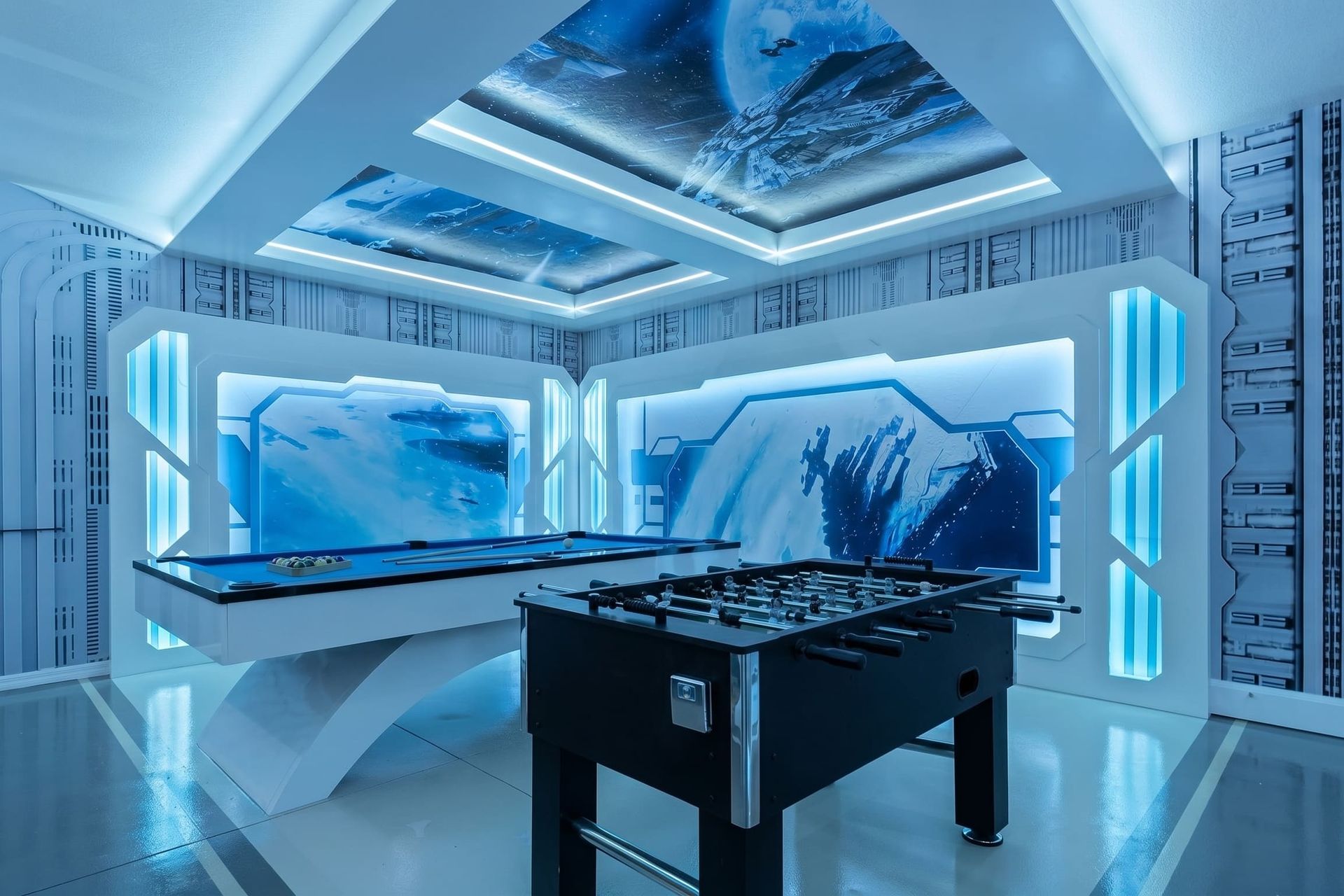 High-tech game room with a glowing ceiling mural.
