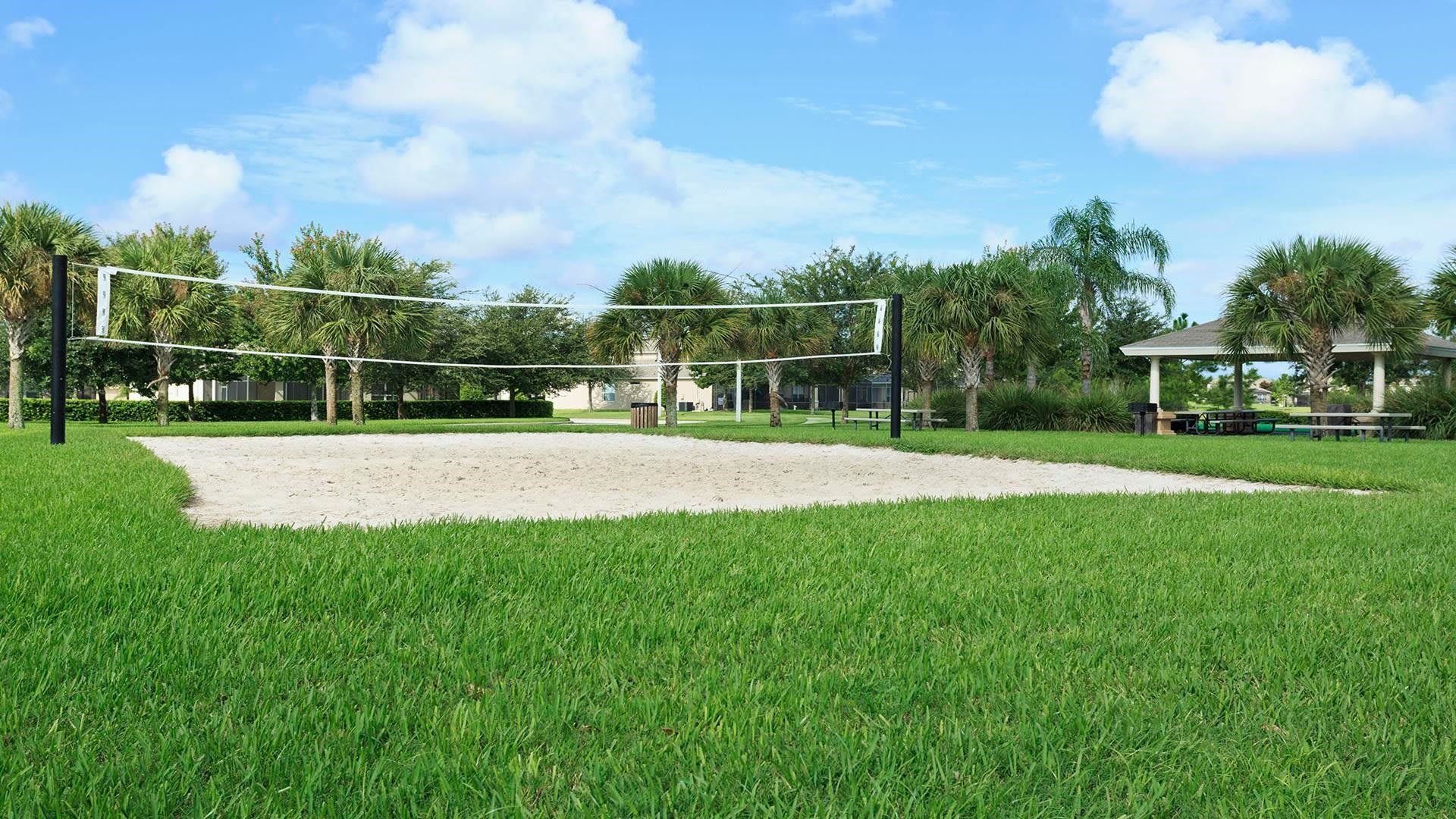 
Enjoy a game of beach volleyball in this lush resort setting with picnic areas!