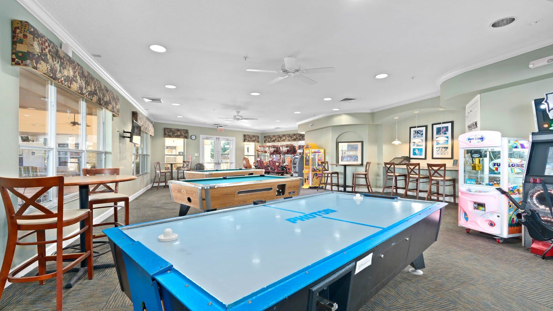 
Game room fun! Enjoy air hockey, pool, arcades & more in this resort clubhouse!