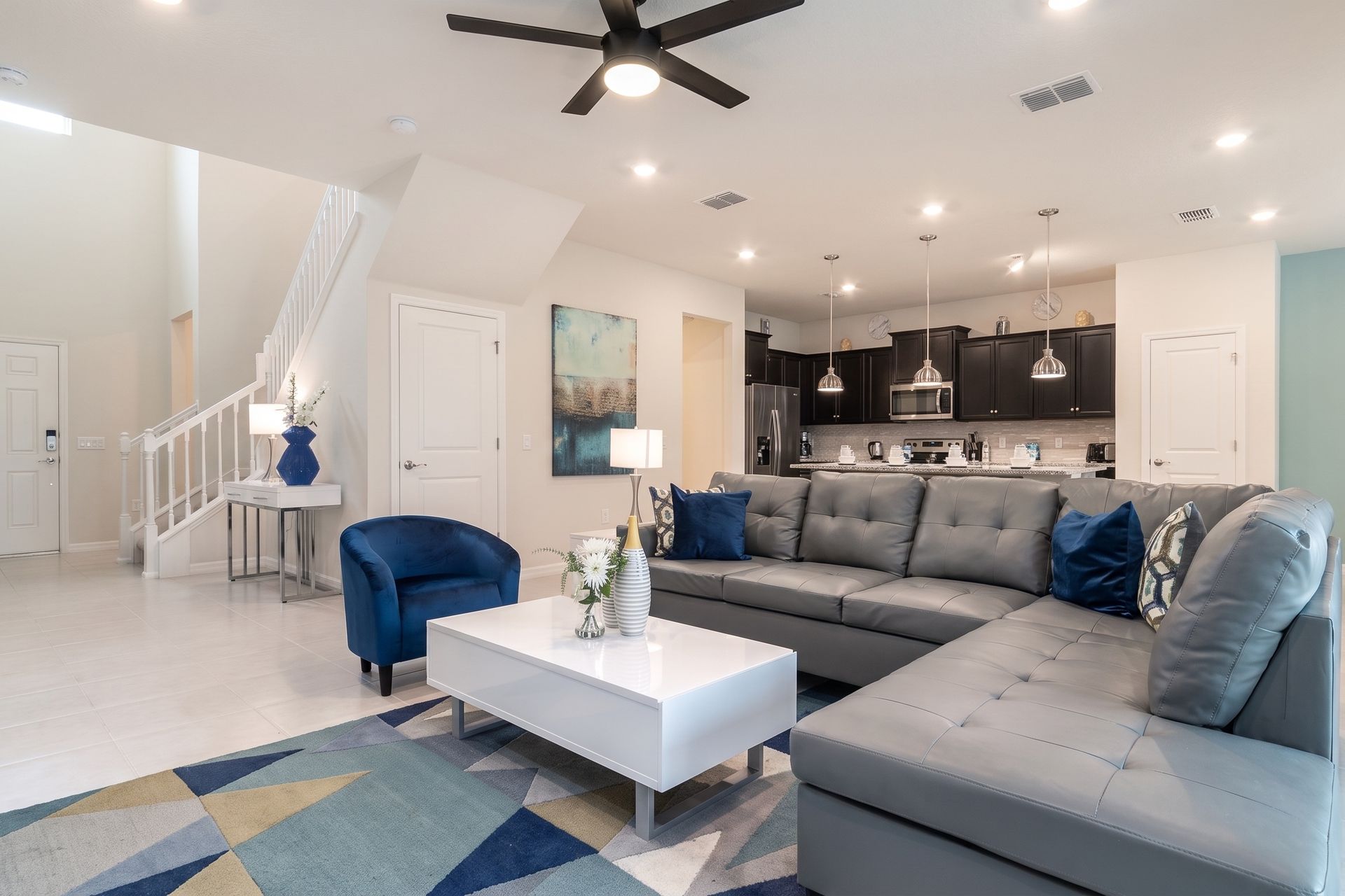 Living Room: Spacious and inviting, the area features a cozy sofa, ideal for family reunions and creating lasting memories