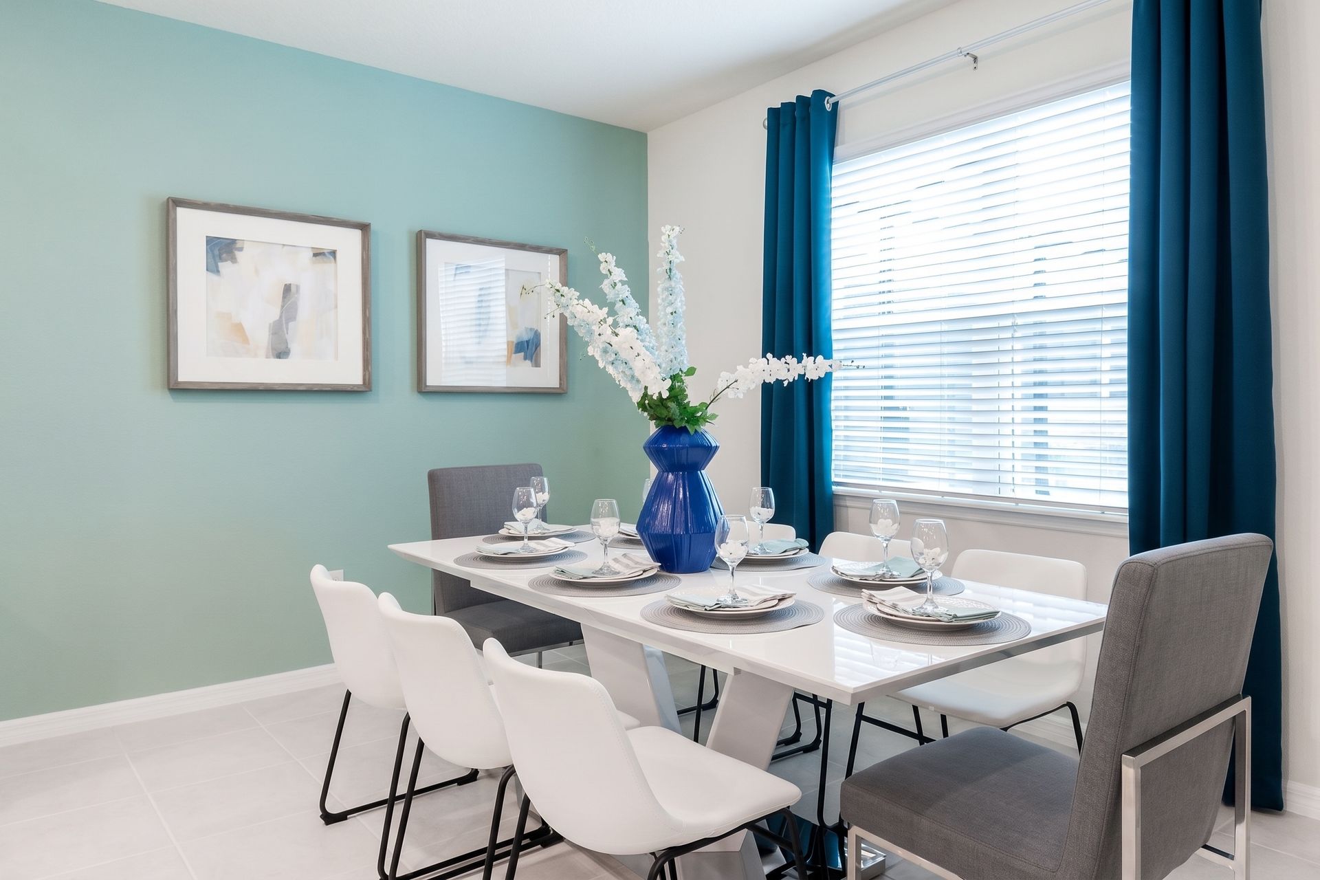 Dining Table: Spacious and inviting, the 8-seater table provides a comfortable setting for larger gatherings and enjoyable meals