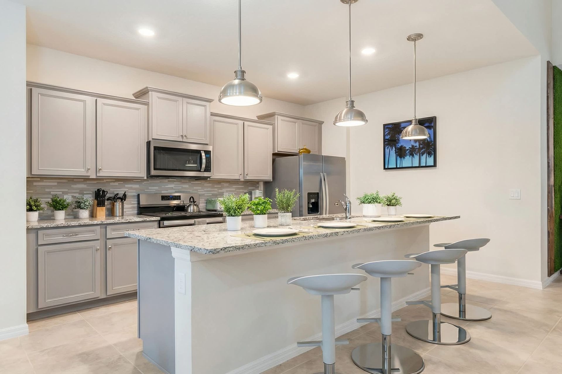 Modern kitchen seamlessly integrated with a sleek mini breakfast bar