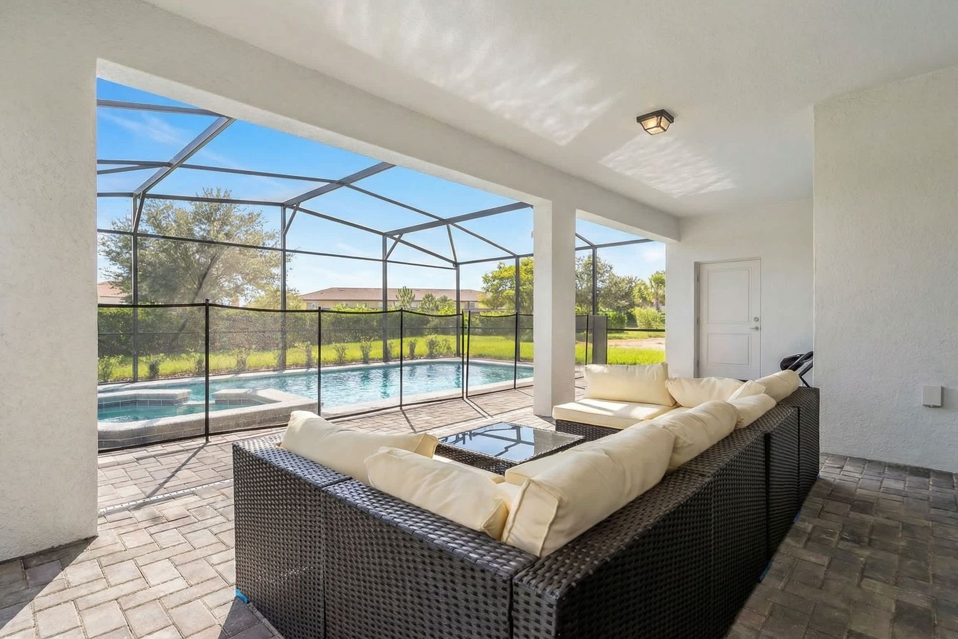 Seating with pool view, offering relaxation in a scenic setting