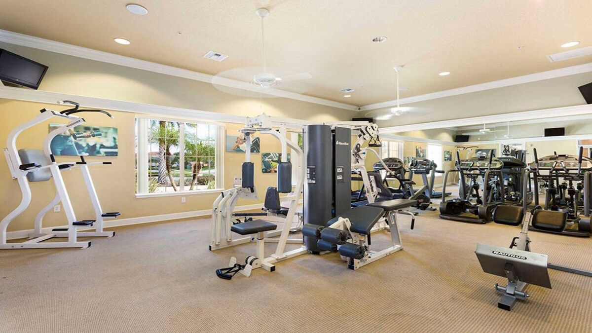 Fully equipped fitness center with modern machines and sunny views!