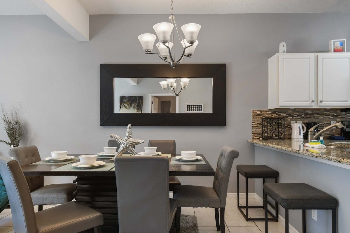 Stylish dining area with modern decor, perfect for cozy meals!