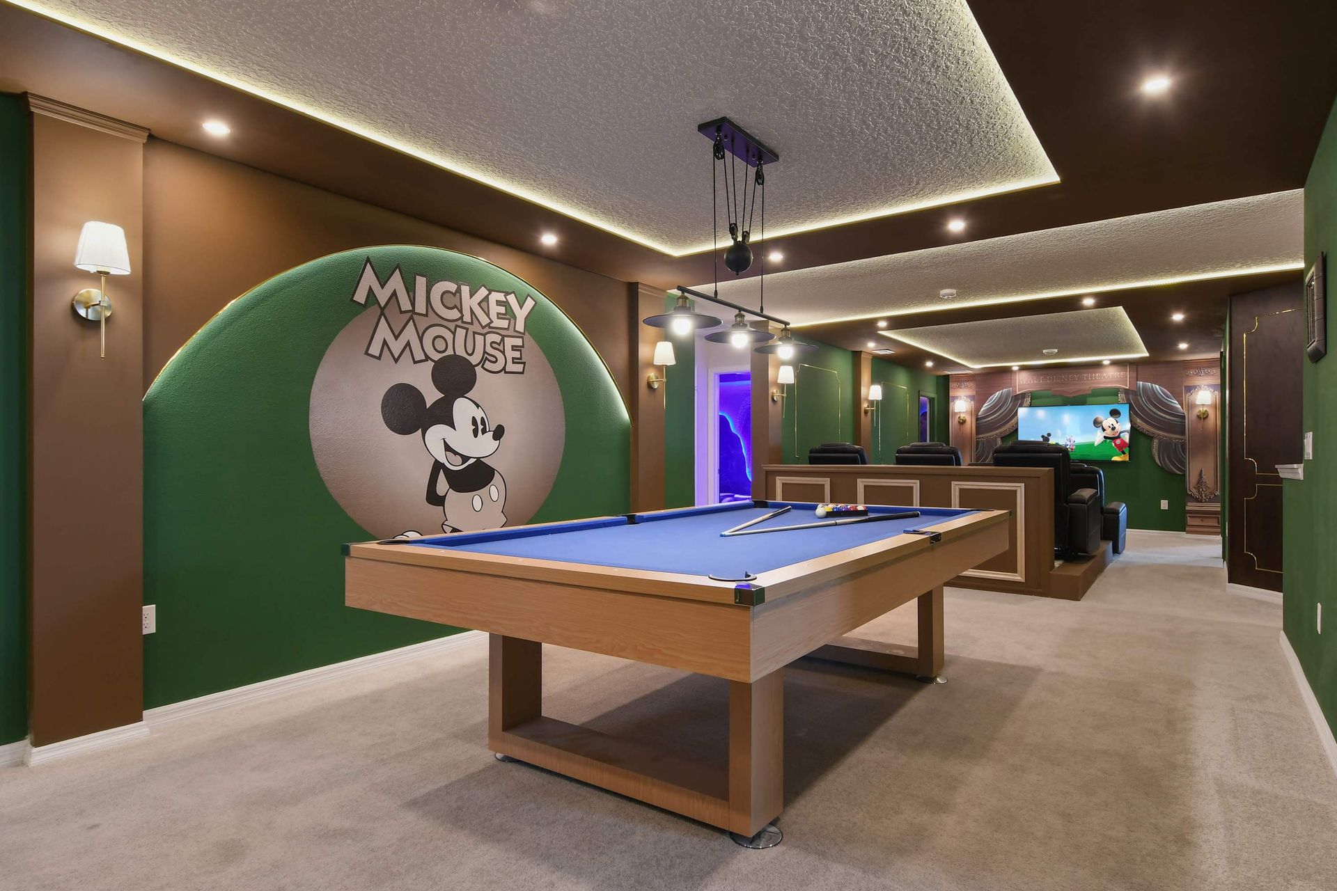 Entertainment room with Mickey Mouse decor, pool table, and theater!
