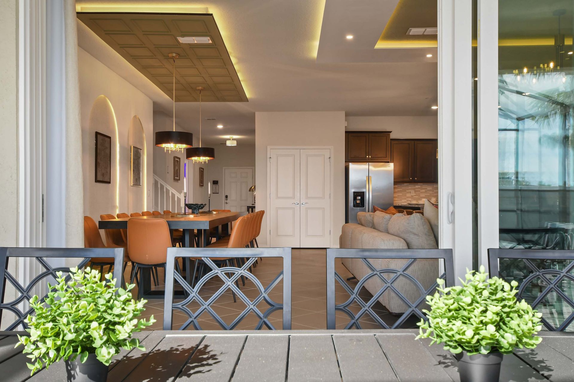 Elegant indoor-outdoor flow with open dining and living spaces!