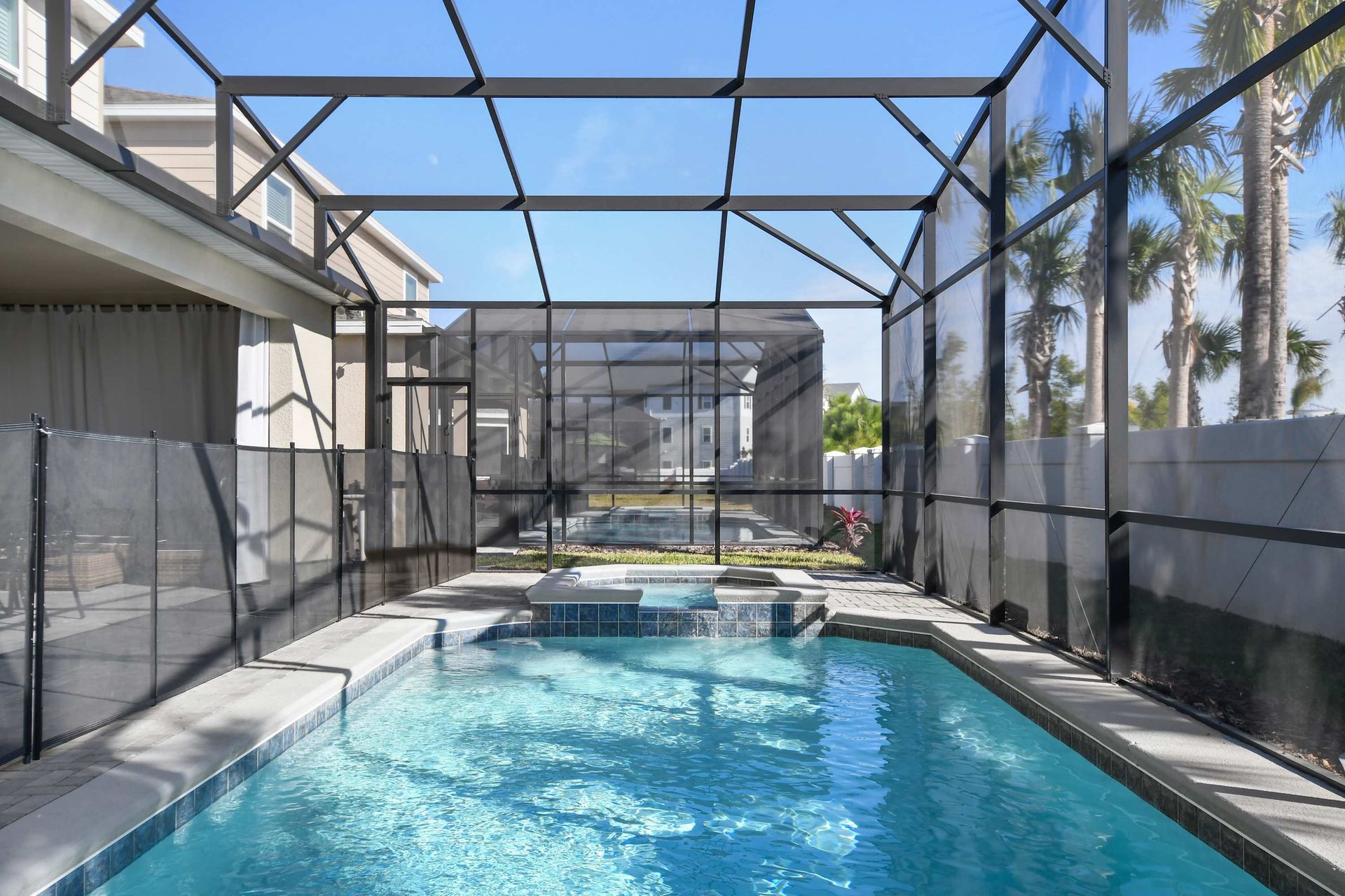 Private screened pool with spa, perfect for relaxing under the sun!