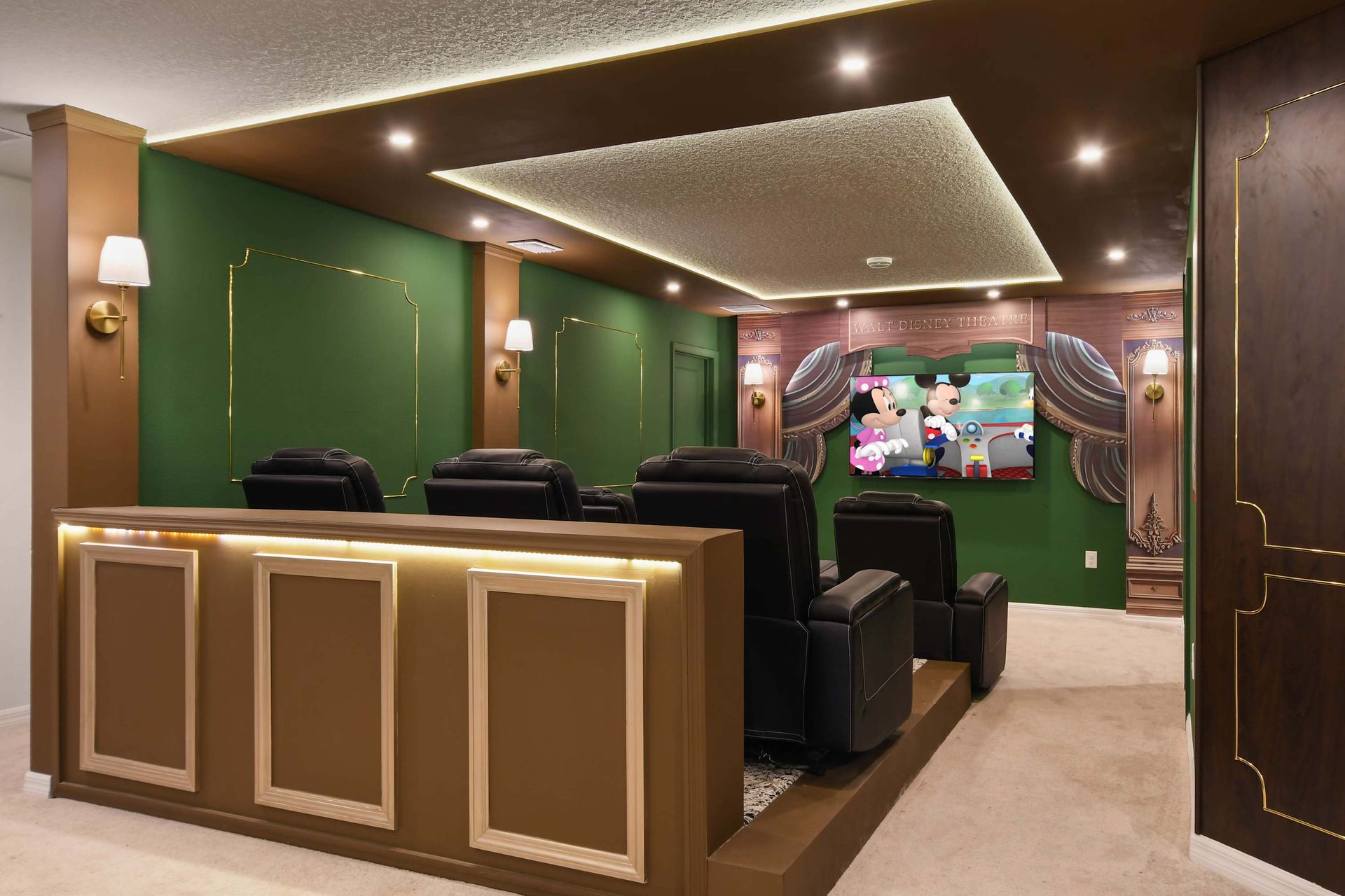 Luxury Disney-themed home theater with plush seating & ambiance!