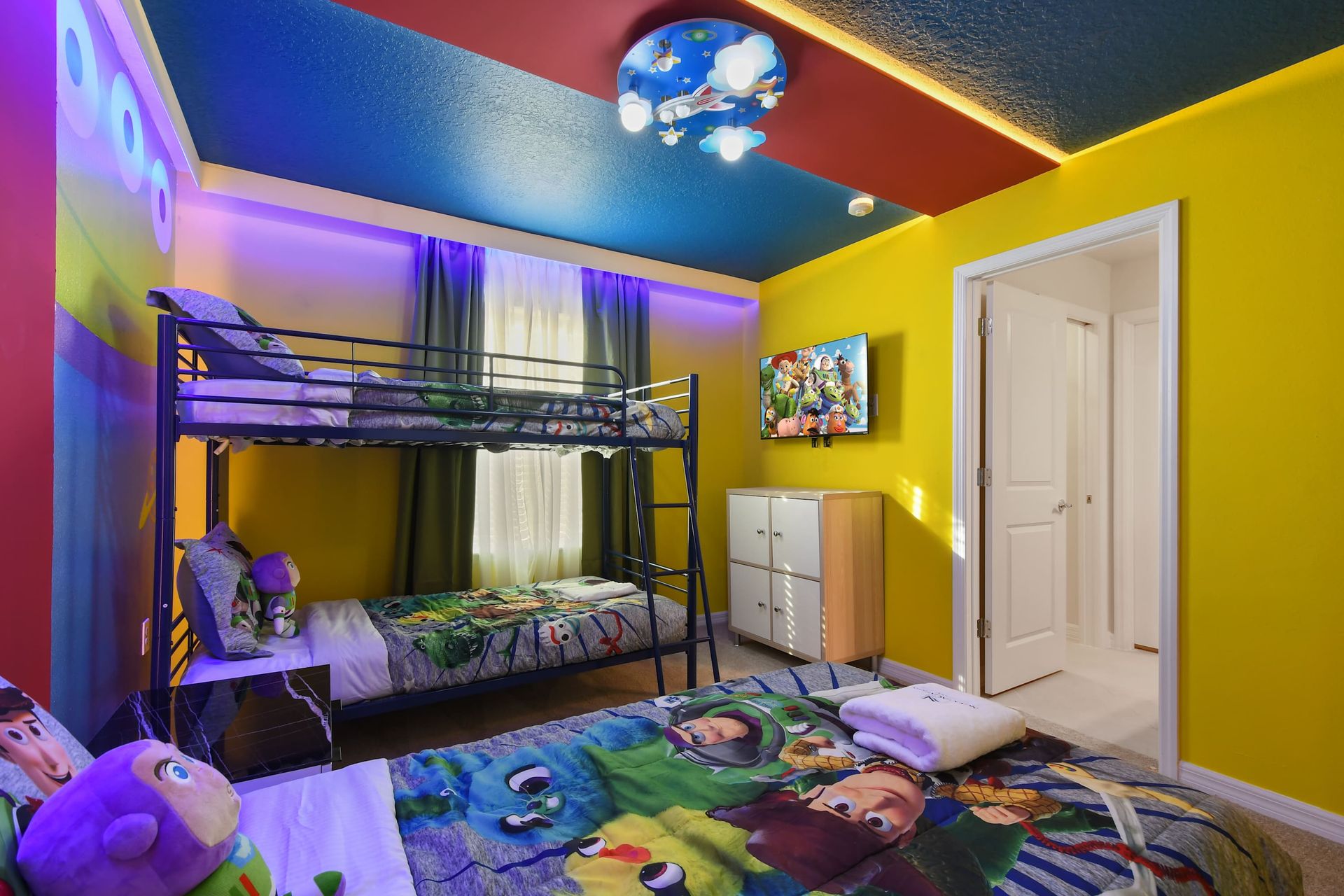 Bright Toy Story-themed bedroom with fun bunk beds and cozy vibes!