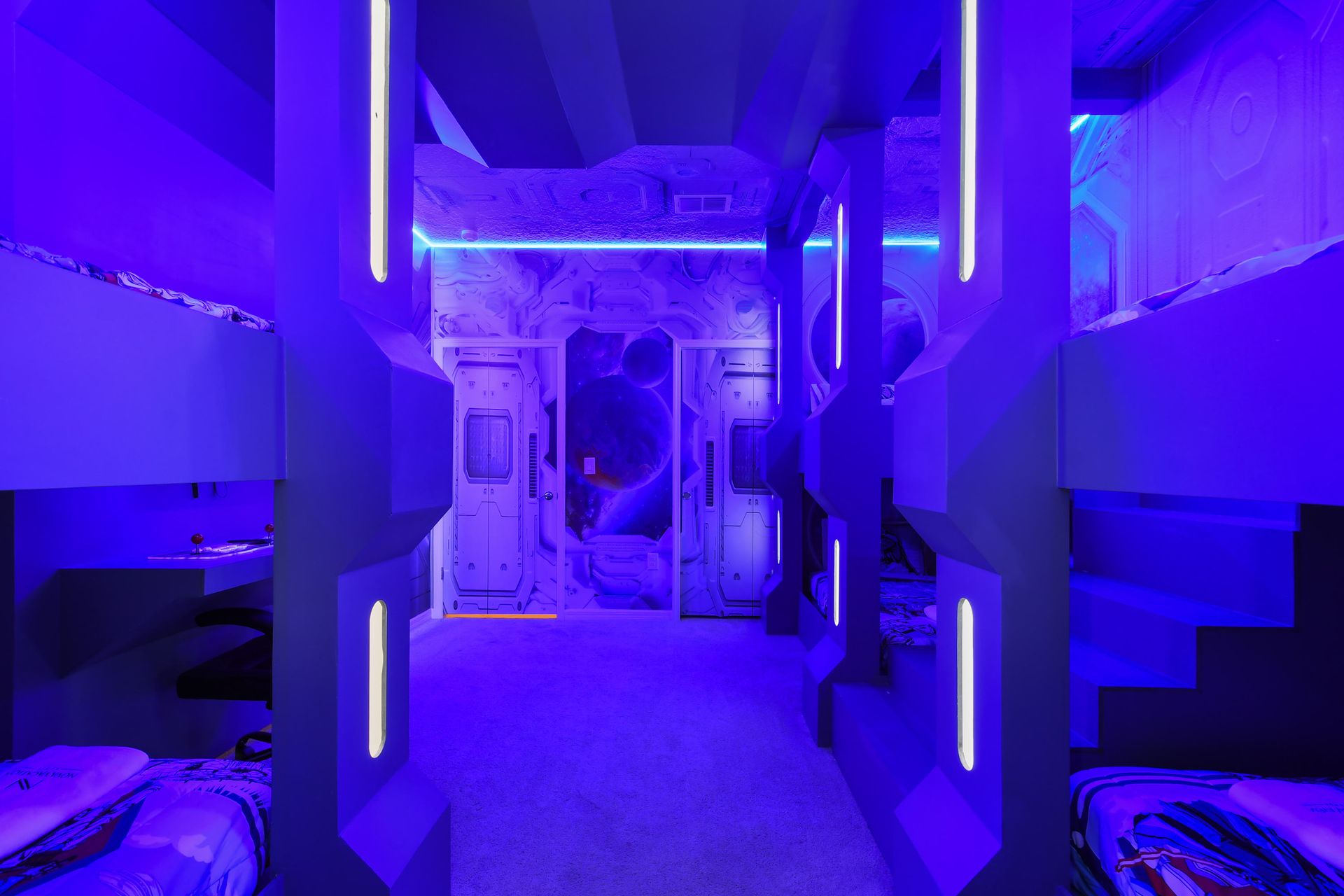 Immersive galactic bunk room with glowing lights and space-themed decor!