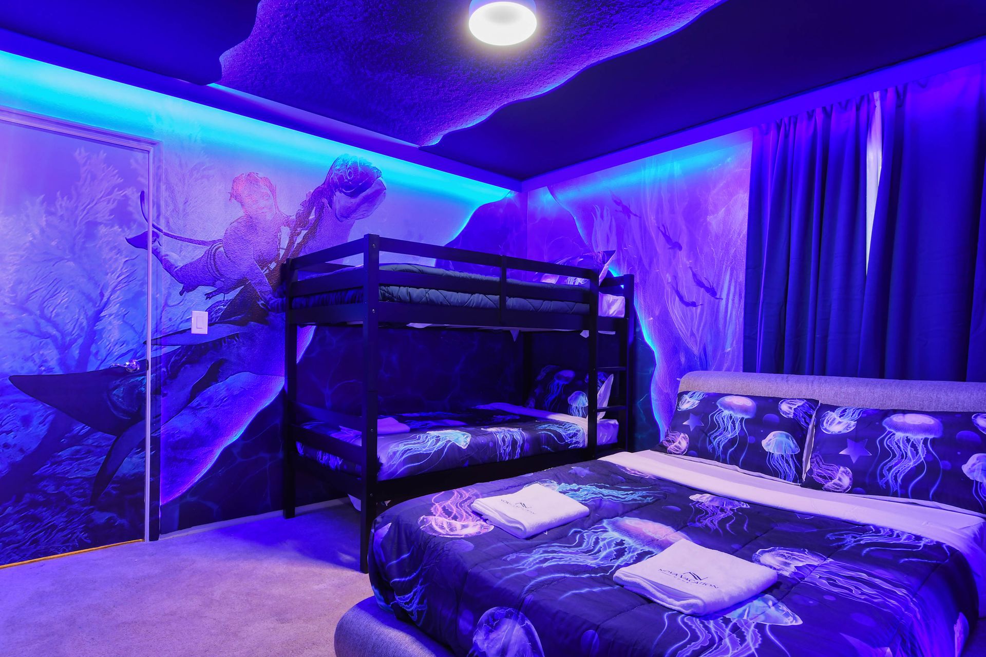 Vivid Avatar-themed bedroom with glowing ocean vibes and bunk beds!